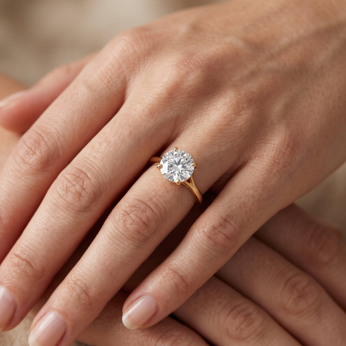 Blanche Solitaire Split Shank Round Diamond Engagement Ring in Rose Gold - lifestyle.jpg