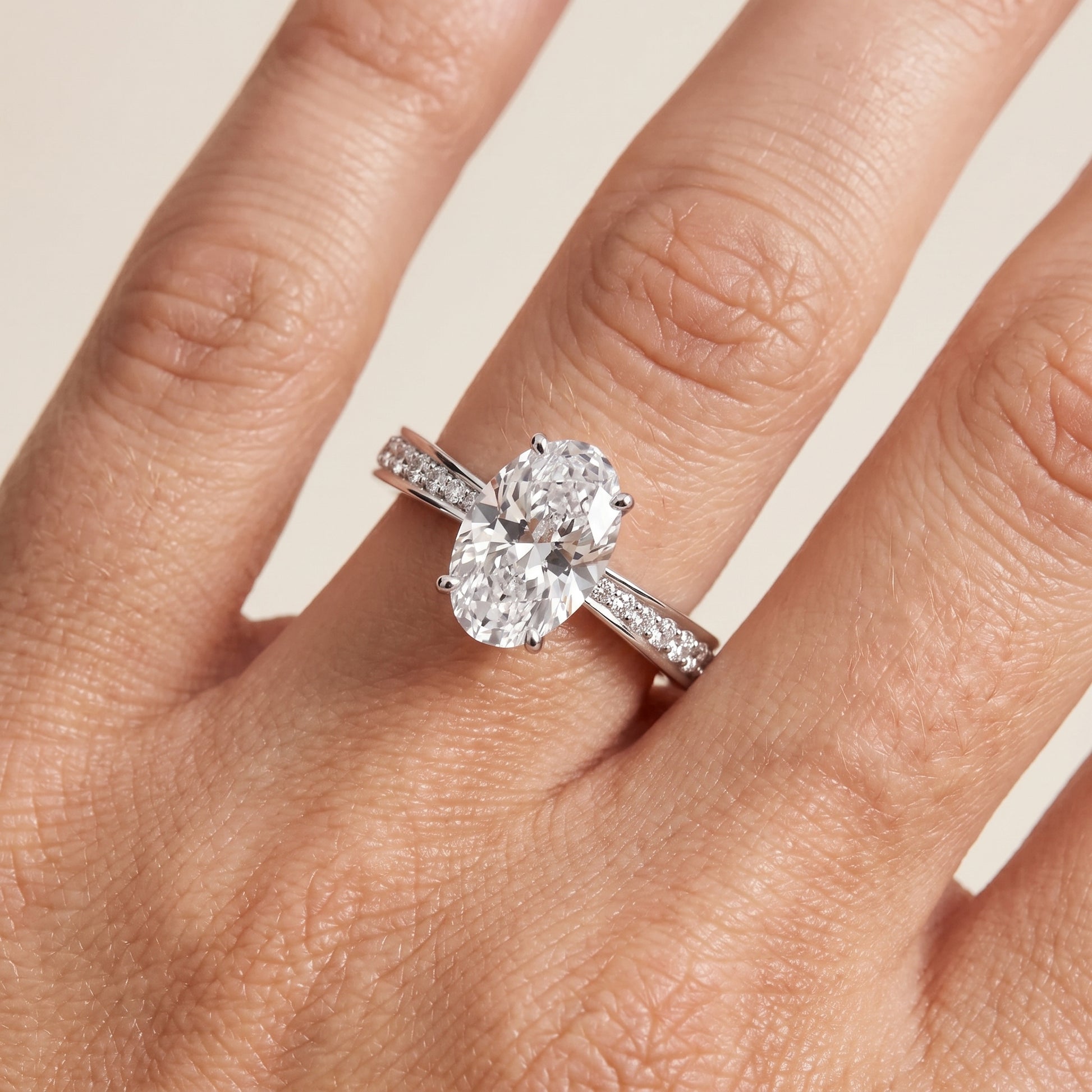 Rhea Sidestone Pavé Oval Diamond Engagement Ring in Silver - lifestyle.jpg