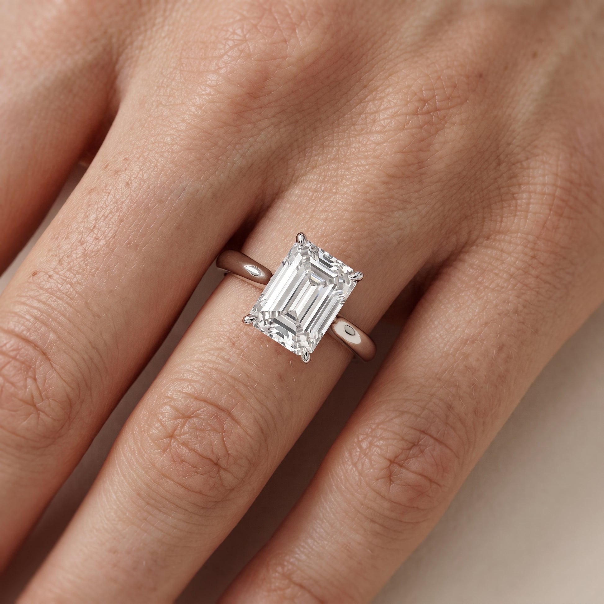 Evie Solitaire Six-Prong Emerald Diamond Engagement Ring in Silver - lifestyle.jpg