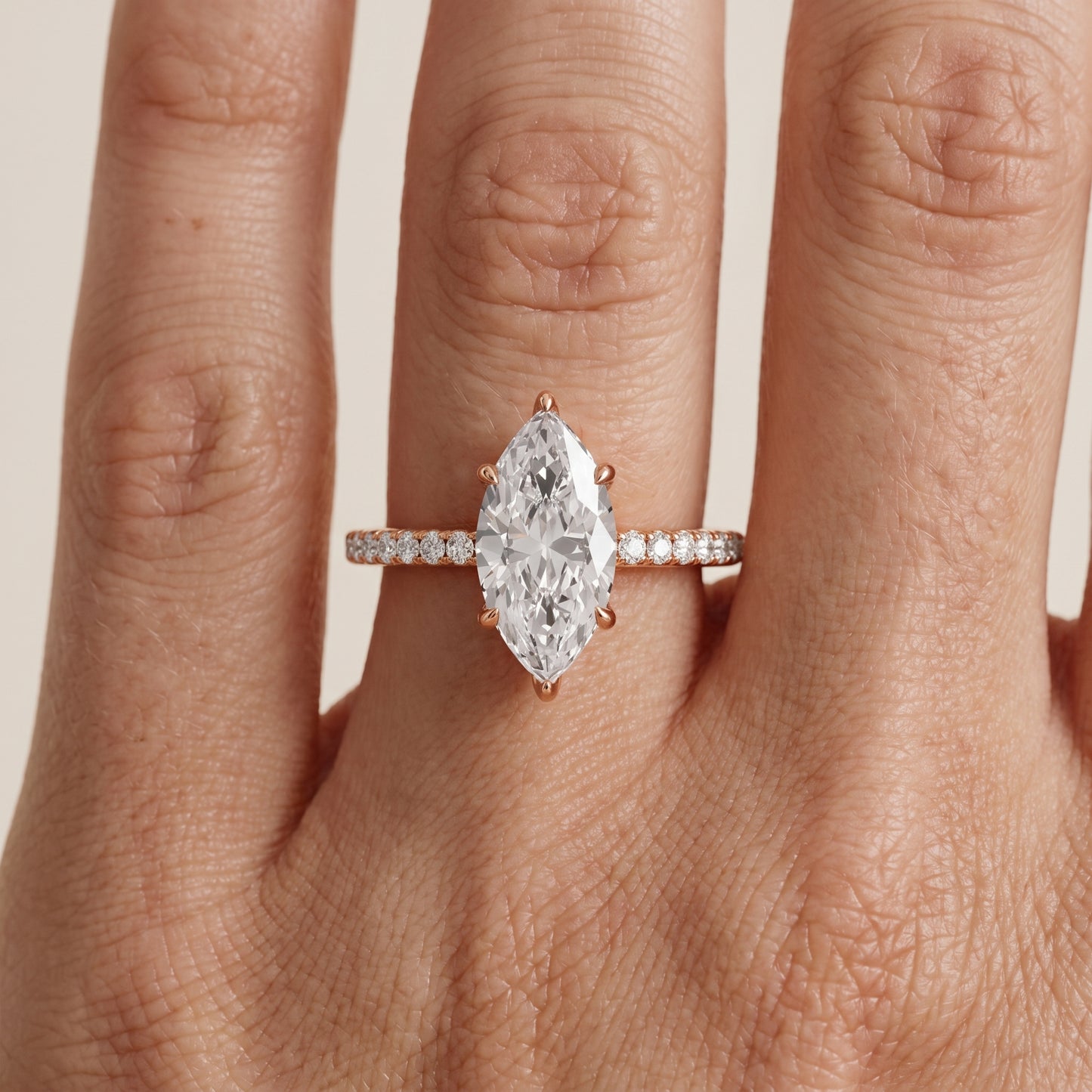Ione Solitaire Pavé Marquise Diamond Engagement Ring in Rose Gold - lifestyle.jpg
