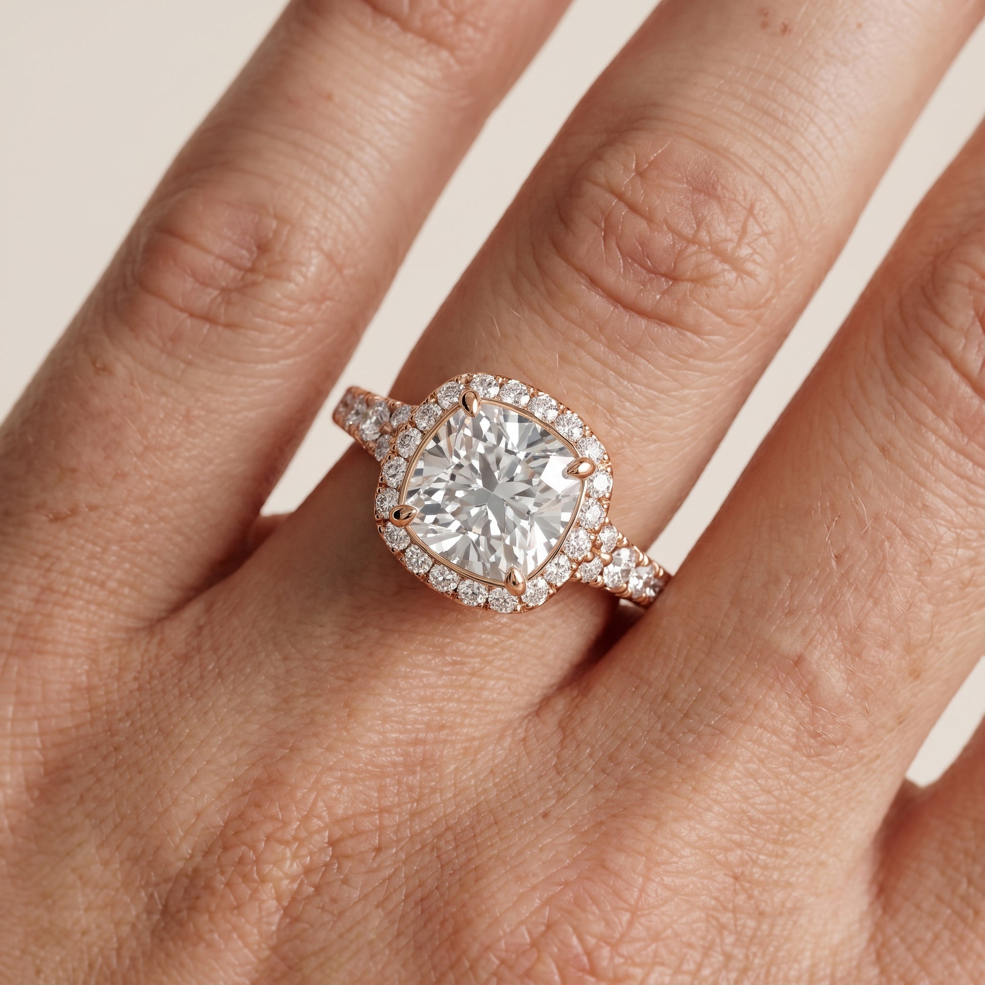Bella Halo Pavé Cushion Diamond Engagement Ring in Rose Gold - lifestyle.jpg