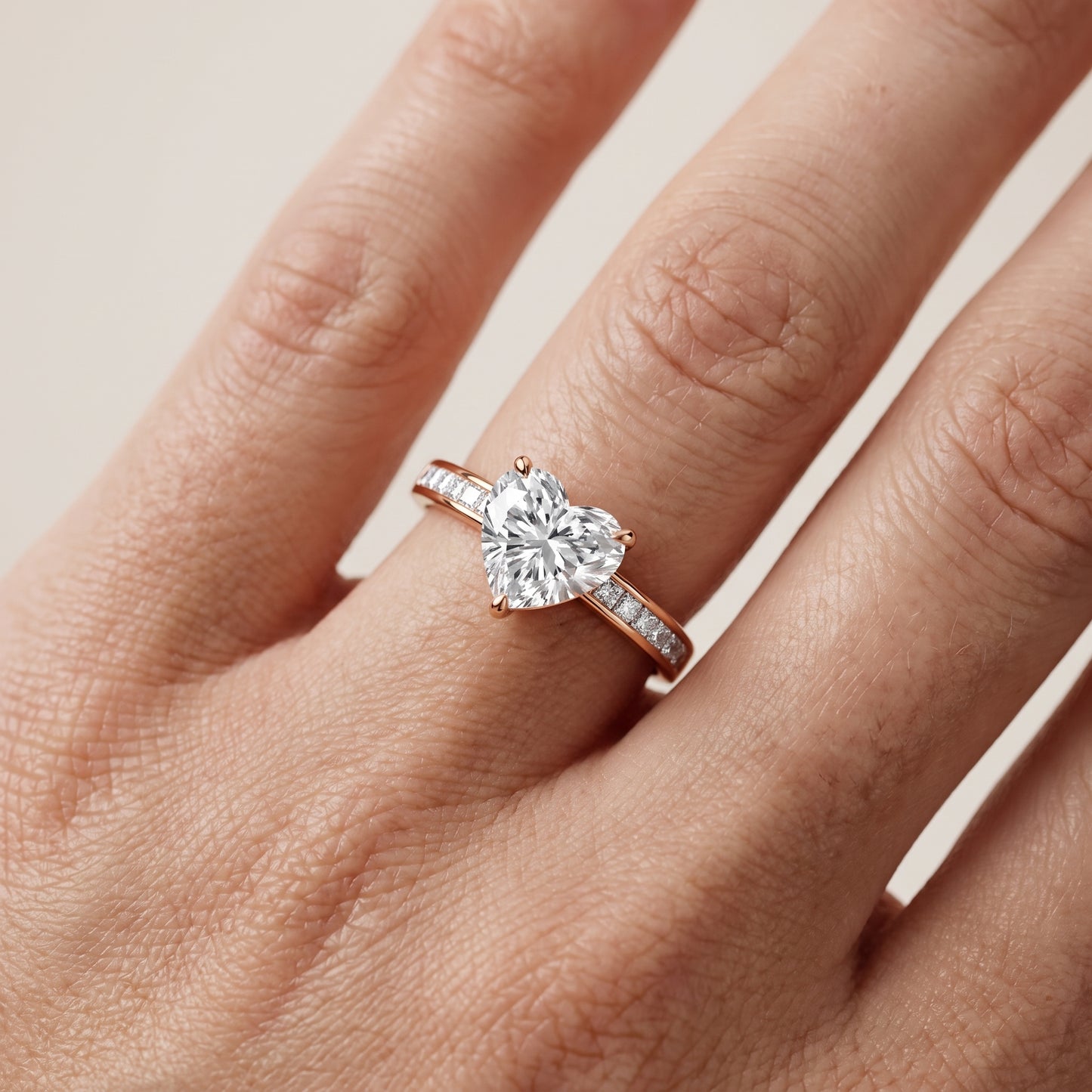 Maren Sidestone Channel Set Heart Diamond Engagement Ring in Rose Gold - lifestyle.jpg