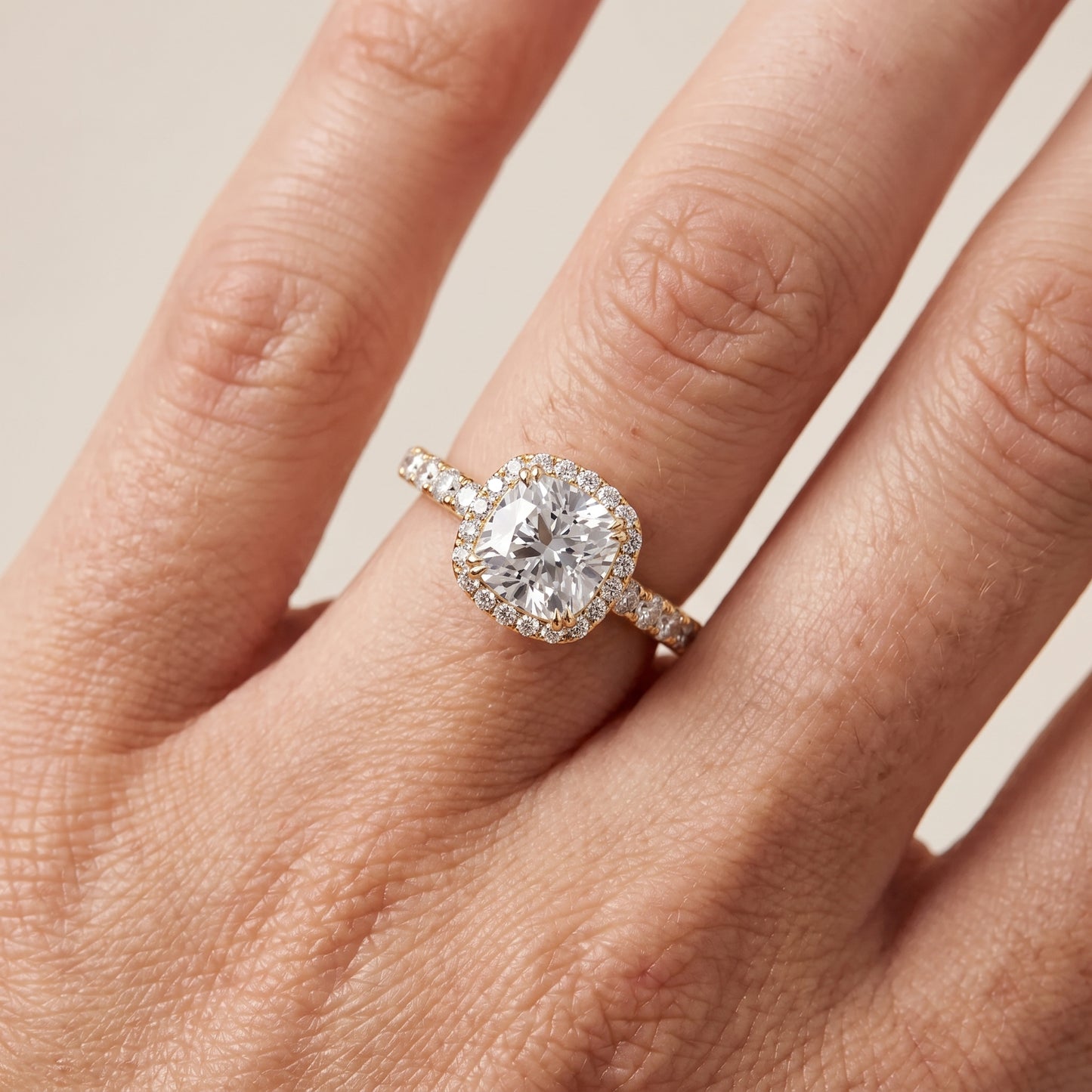 Chloe Halo Pavé Cushion Diamond Ring in Yellow Gold - lifestyle.jpg