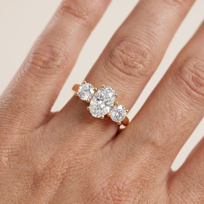 Callie Three-Stone Trellis Oval Diamond Engagement Ring in Yellow Gold - lifestyle.jpg