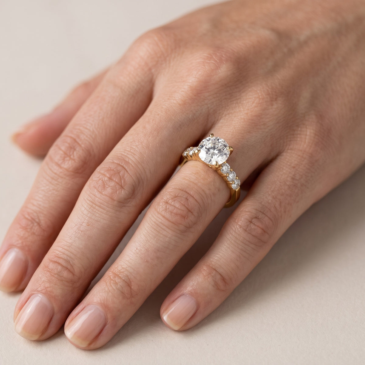 Lise Graduated Seven-Stone Round Diamond Engagement Ring in Platinum - lifestyle.jpg