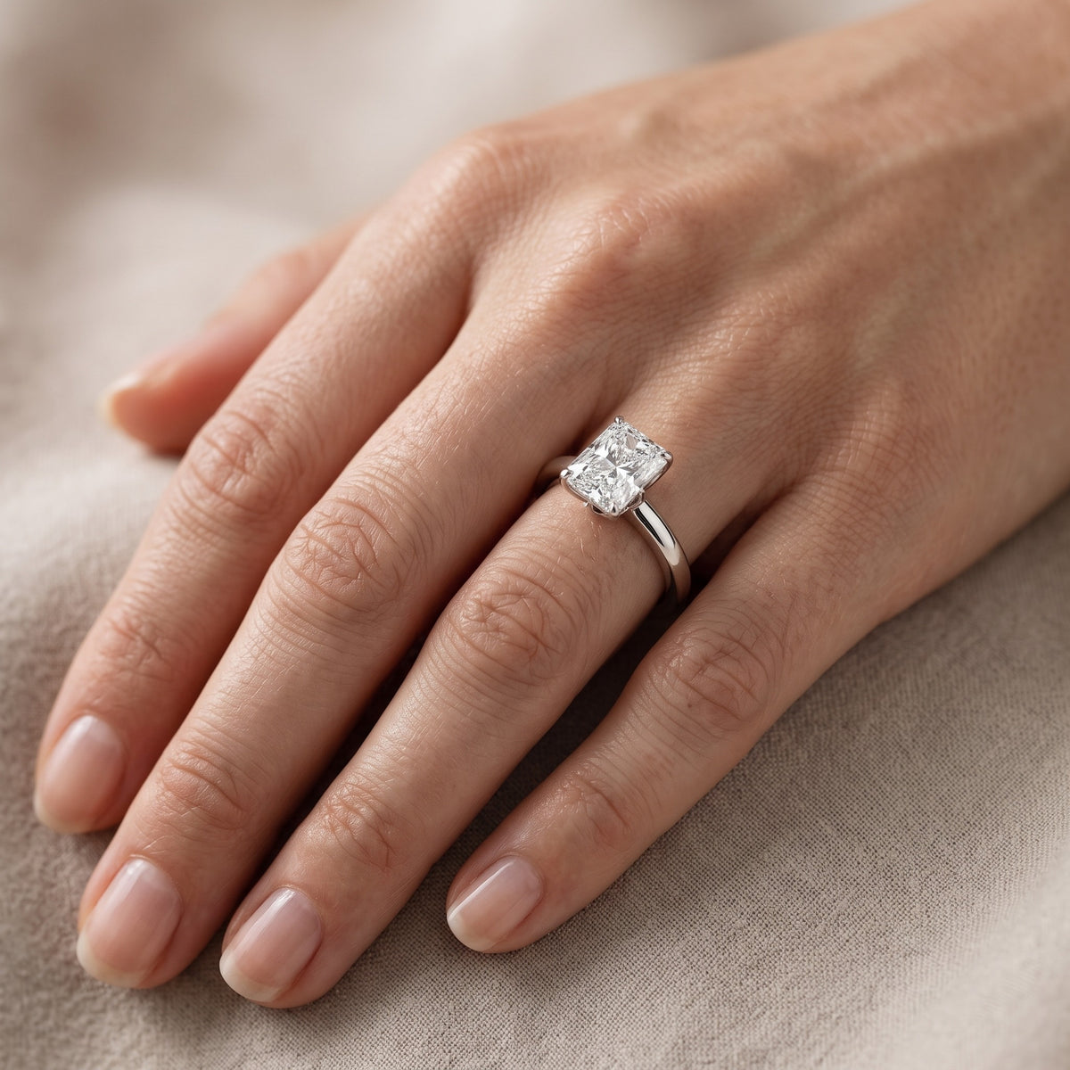 Serena Blossom Solitaire Radiant Diamond Engagement Ring in Platinum - lifestyle.jpg