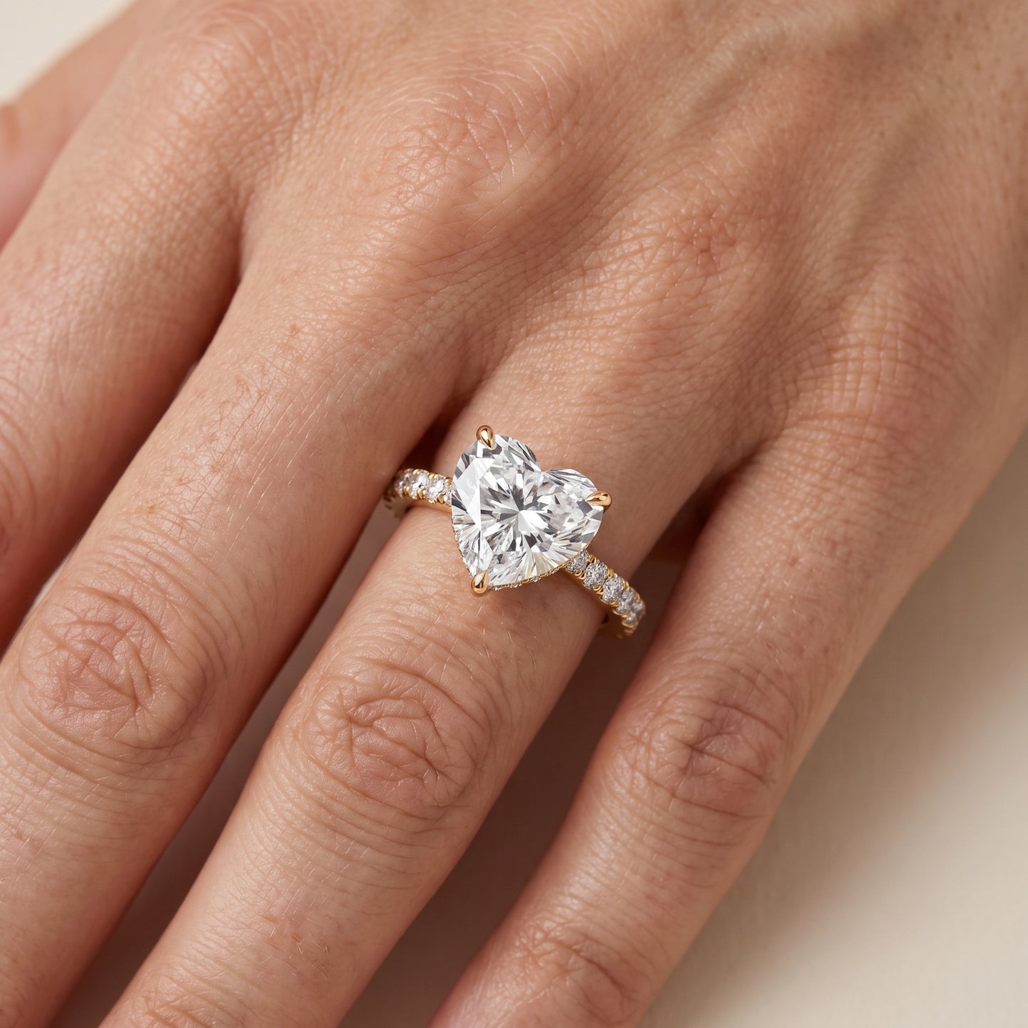 Gia Hidden Halo Pavé Heart Diamond Ring in Yellow Gold - lifestyle.jpg
