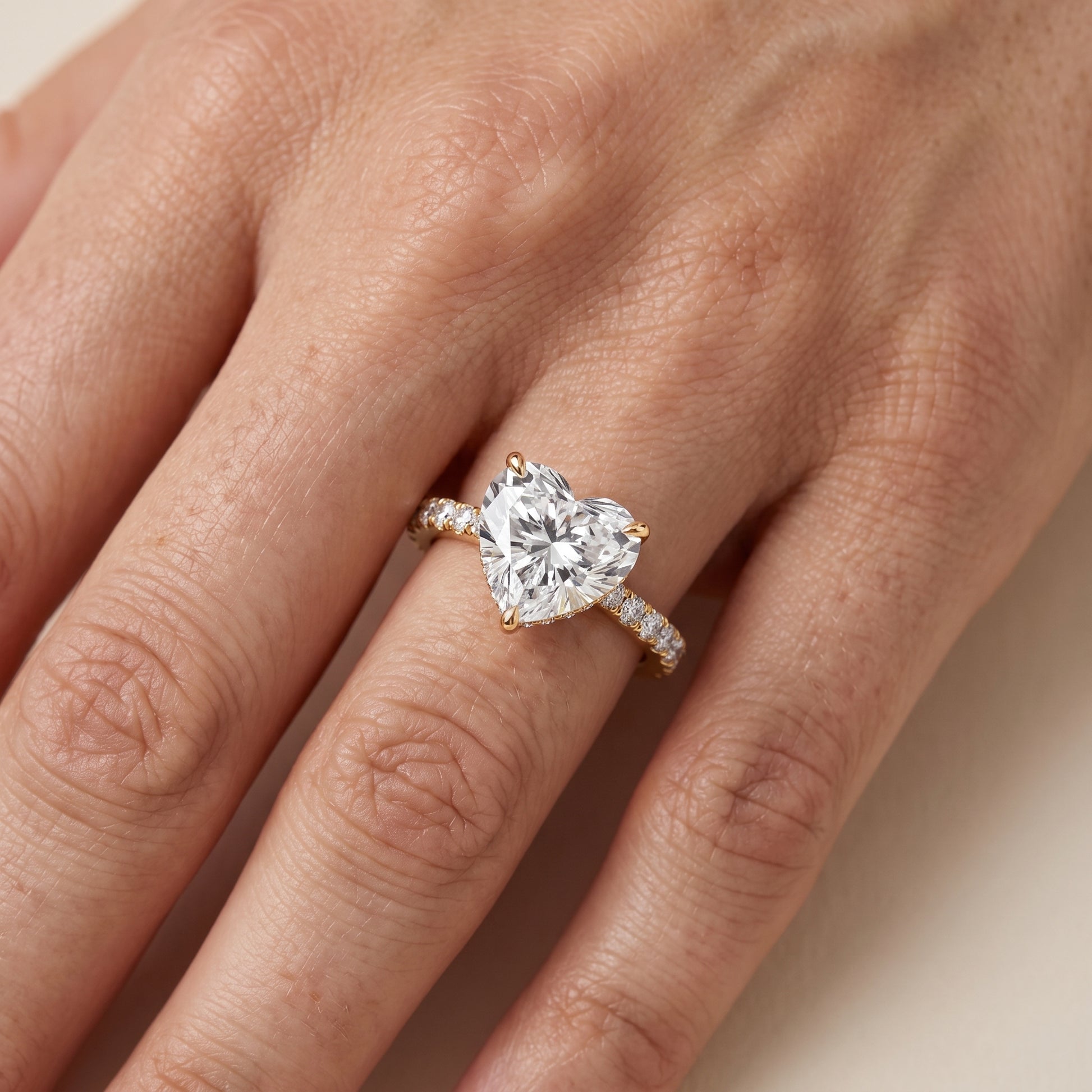 Gia Hidden Halo Pavé Heart Diamond Ring in Yellow Gold - lifestyle.jpg