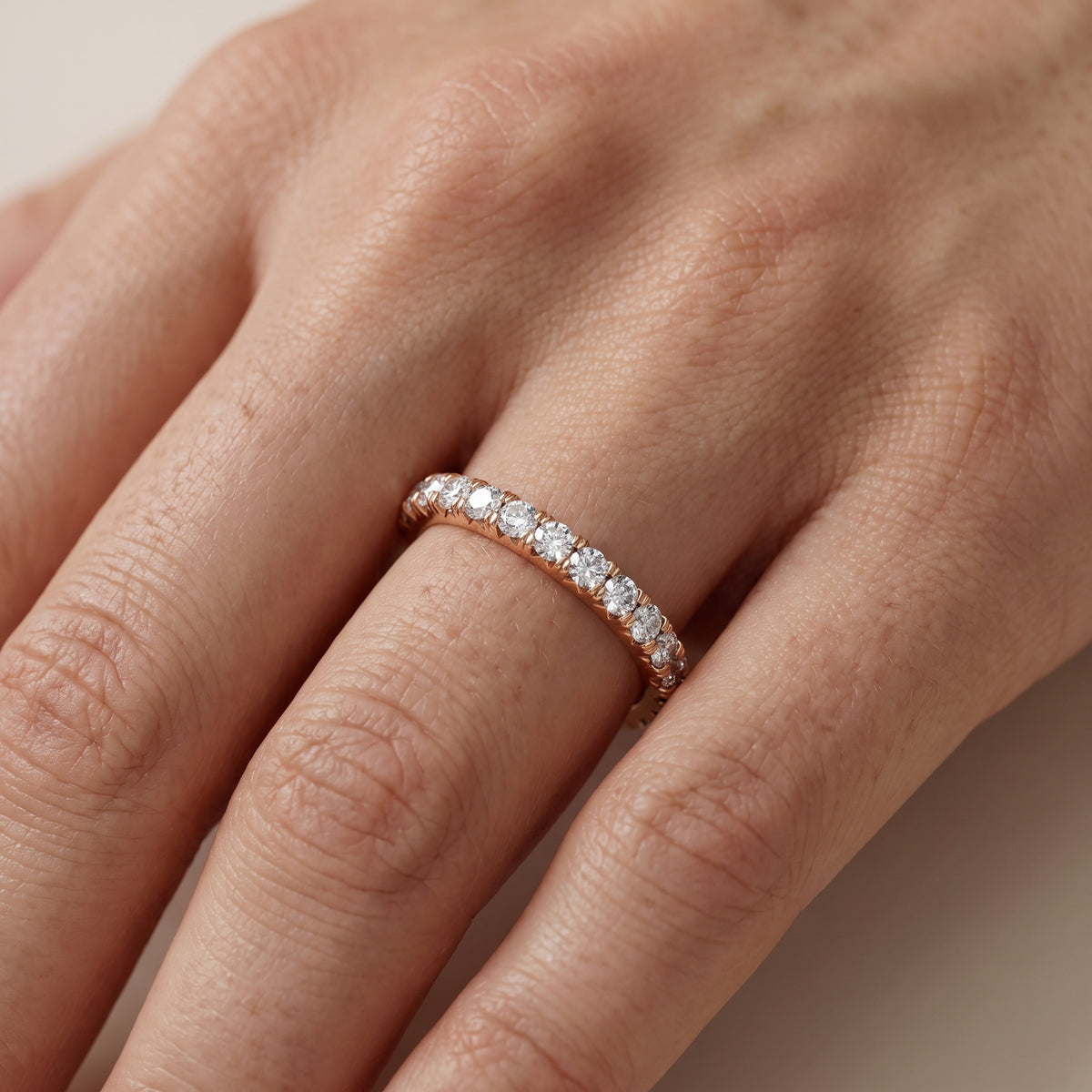 Margaret French Pavé Round Diamond Eternity Band in Rose Gold - lifestyle.jpg