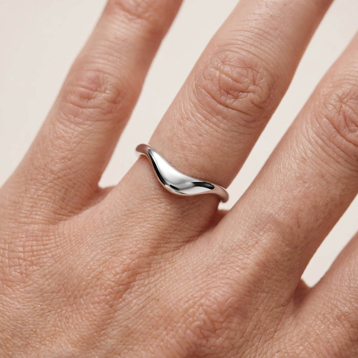 Gwendolyn Curved Contour Wedding Band in Platinum - lifestyle.jpg