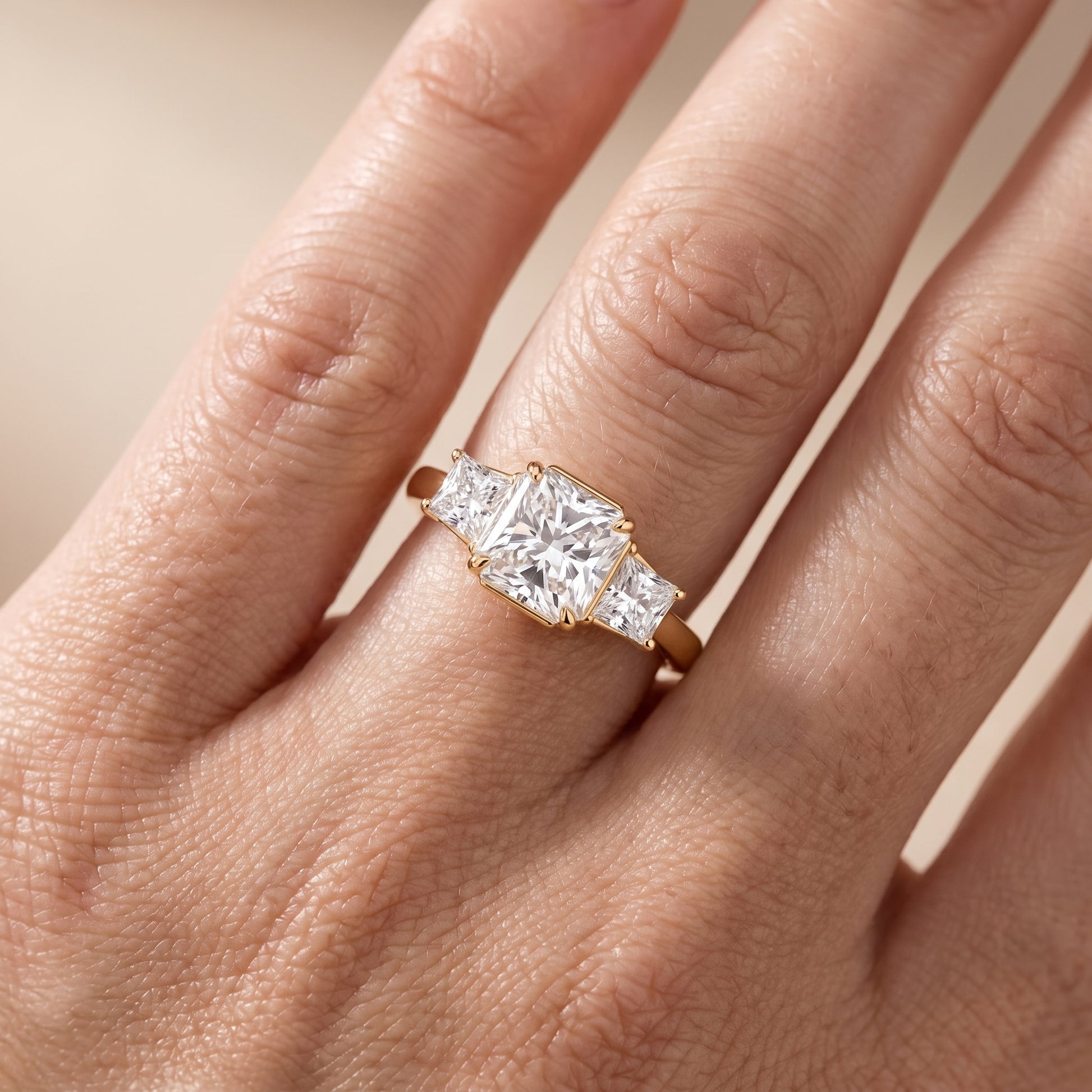 Selena Three-Stone Basket Radiant Diamond Ring in Yellow Gold - lifestyle.jpg