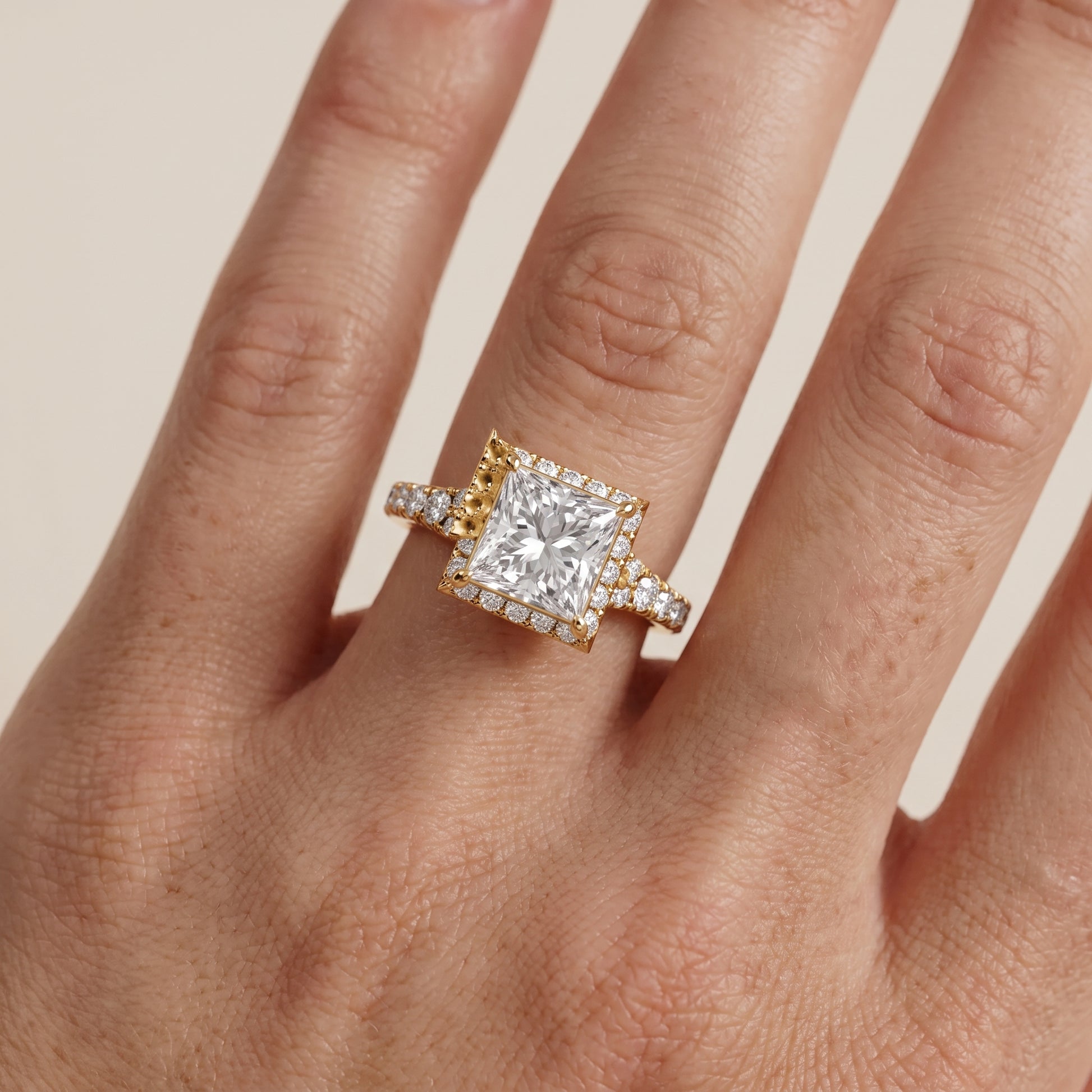 Bella Halo Pavé Princess Diamond Engagement Ring in Yellow Gold - lifestyle.jpg