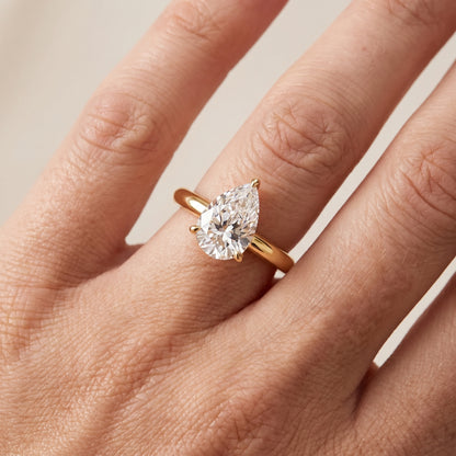 Kalia Knife Edge Solitaire Pear Diamond Engagement Ring in Yellow Gold - lifestyle.jpg