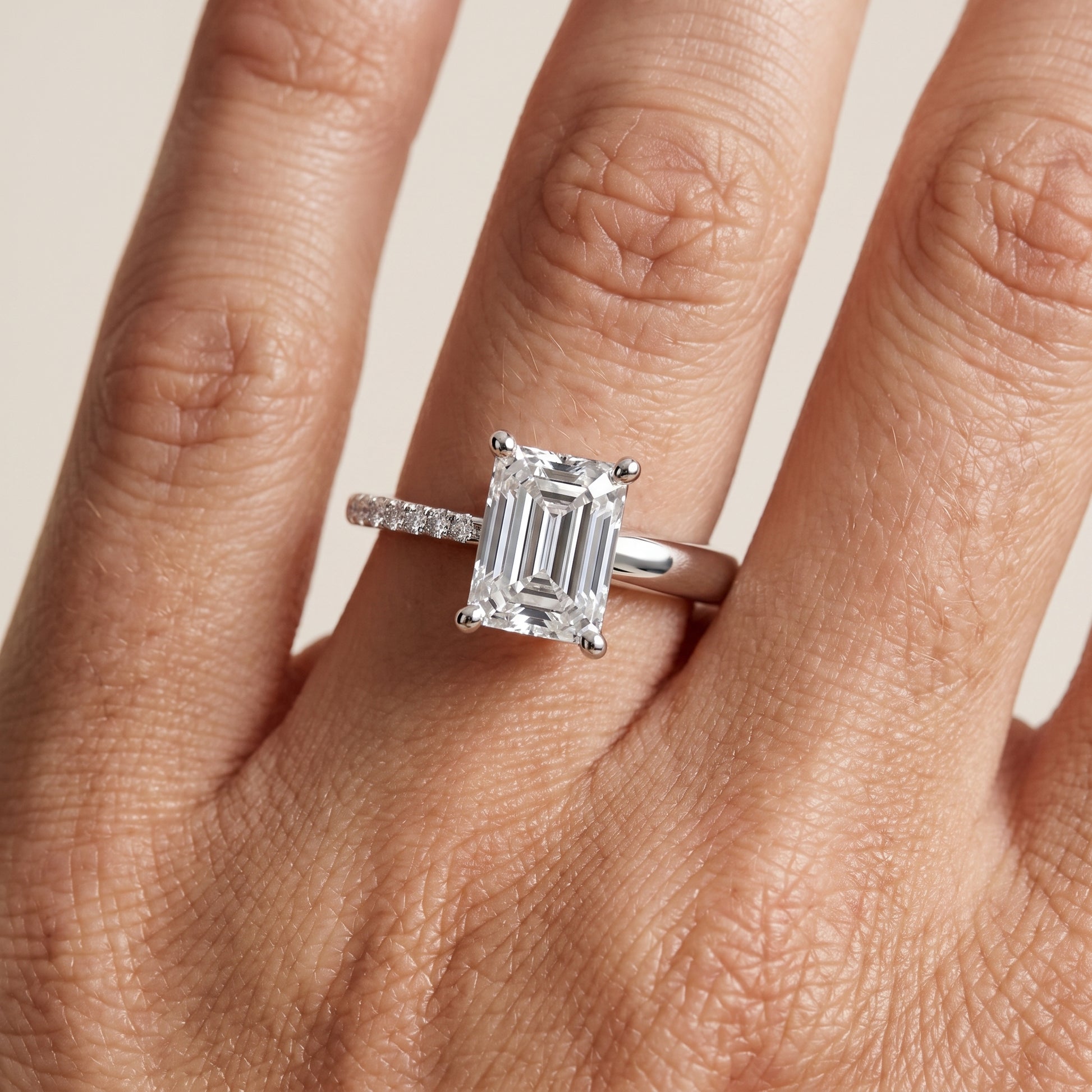 Rosie Solitaire Basket Emerald Diamond Engagement Ring in White Gold - lifestyle.jpg