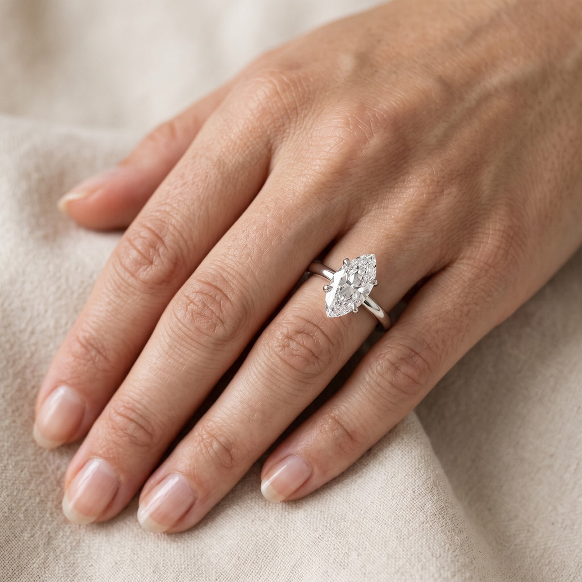 Charlotte Charm Solitaire Marquise Diamond Engagement Ring in Silver - lifestyle.jpg