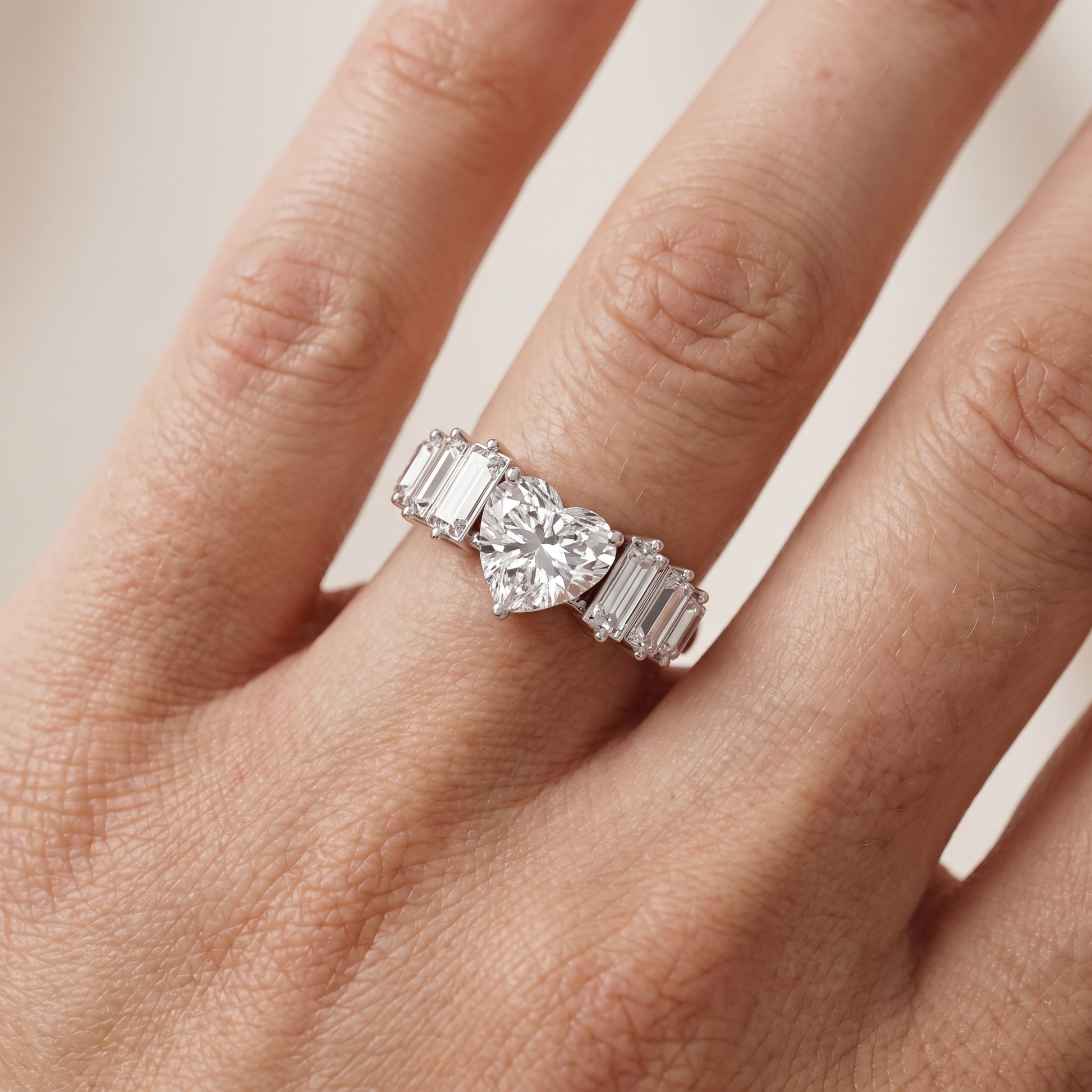 Mara Sidestone Baguette Accent Heart Diamond Engagement Ring in Platinum - lifestyle.jpg