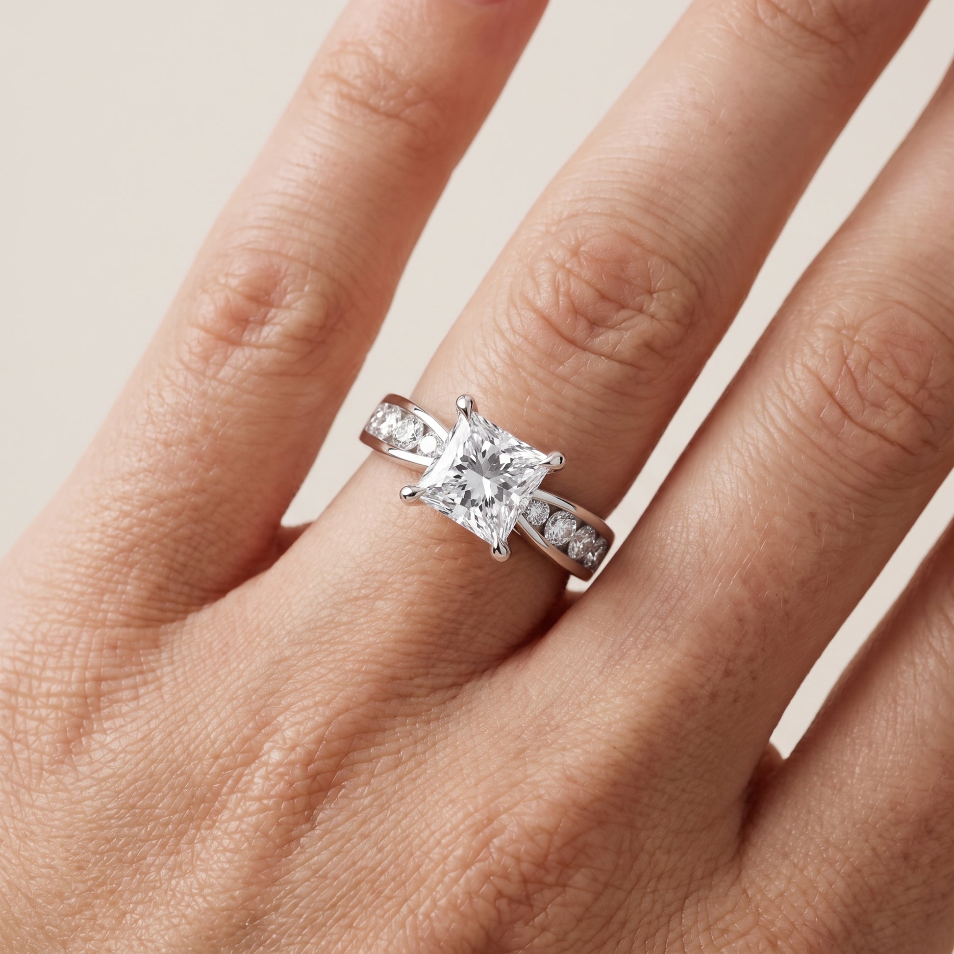 Noor Channel Set Sidestone Princess Diamond Engagement Ring in White Gold - lifestyle.jpg