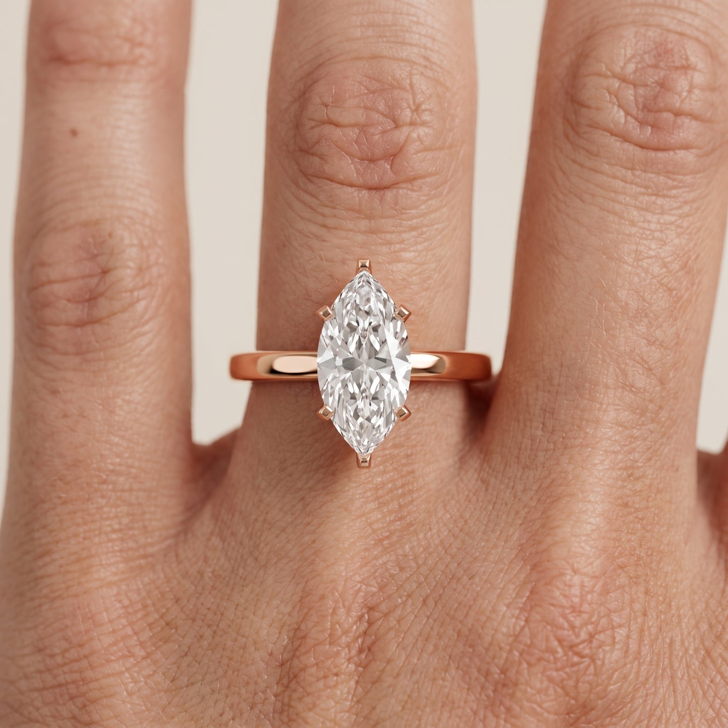 Liana Solitaire Claw Prong Marquise Diamond Engagement Ring in Rose Gold - lifestyle.jpg
