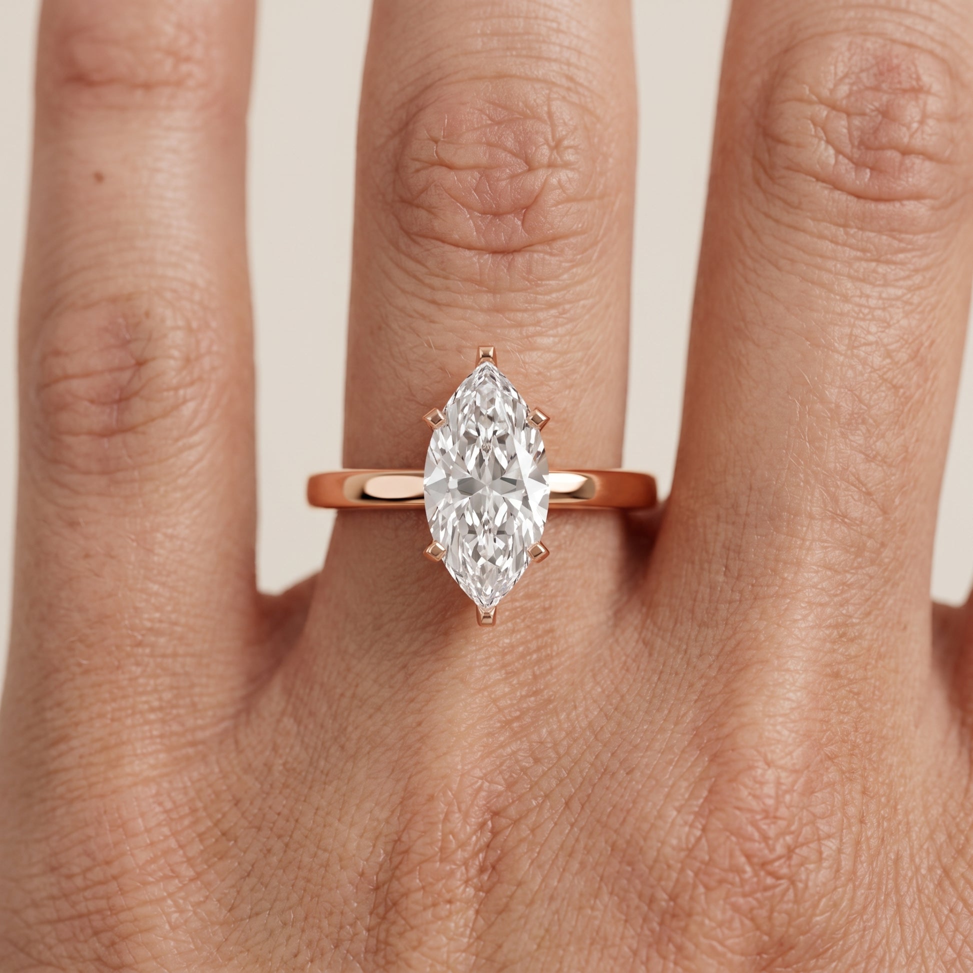 Liana Solitaire Claw Prong Marquise Diamond Engagement Ring in Rose Gold - lifestyle.jpg