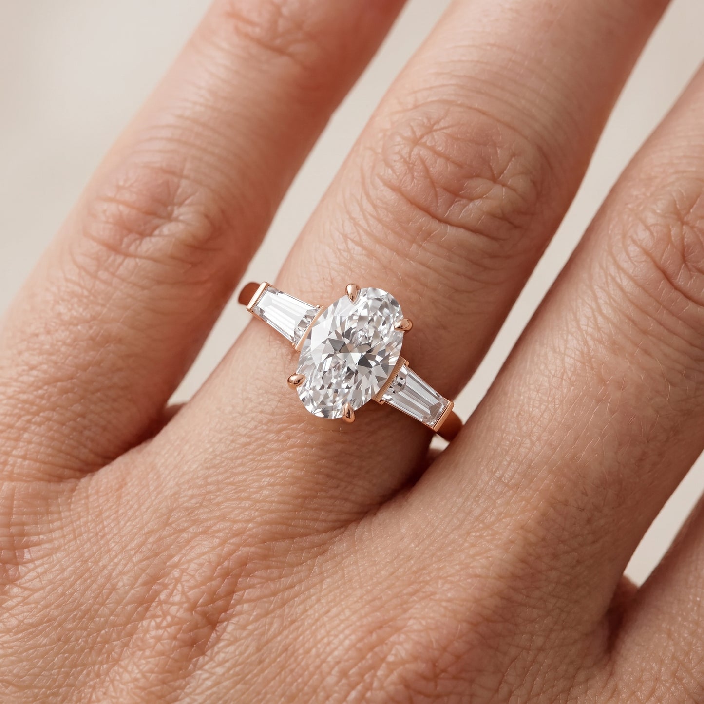 Zelda Tapered Baguette Oval Diamond Engagement Ring in Rose Gold - lifestyle.jpg