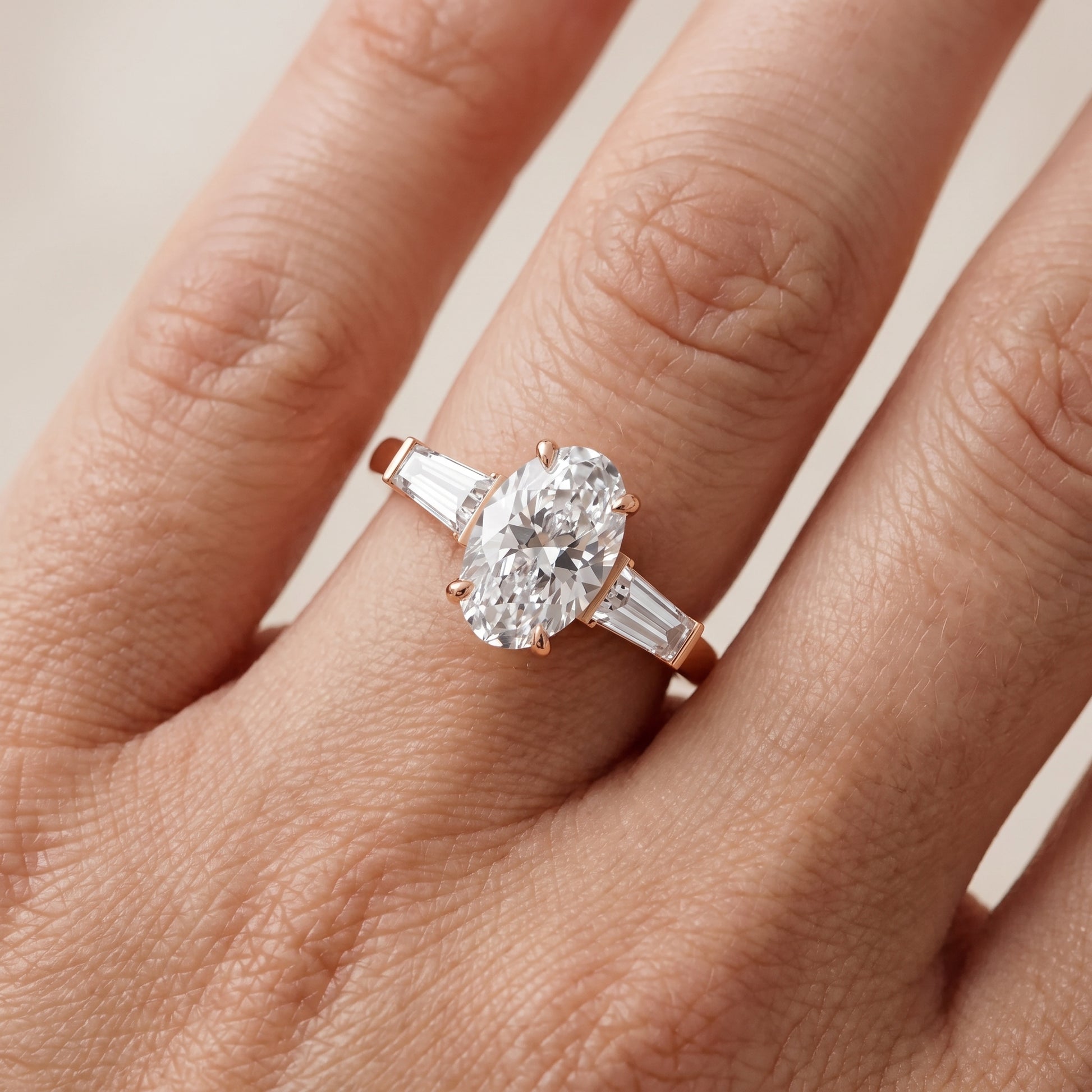 Zelda Tapered Baguette Oval Diamond Engagement Ring in Rose Gold - lifestyle.jpg