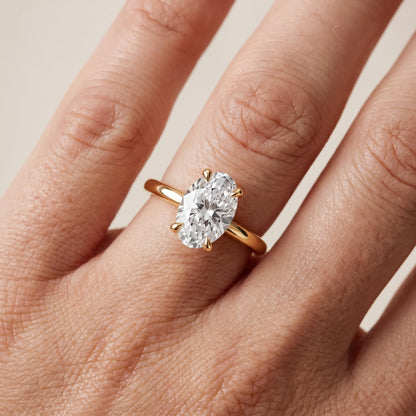 Nella Petite Solitaire Oval Diamond Engagement Ring in Yellow Gold - lifestyle.jpg