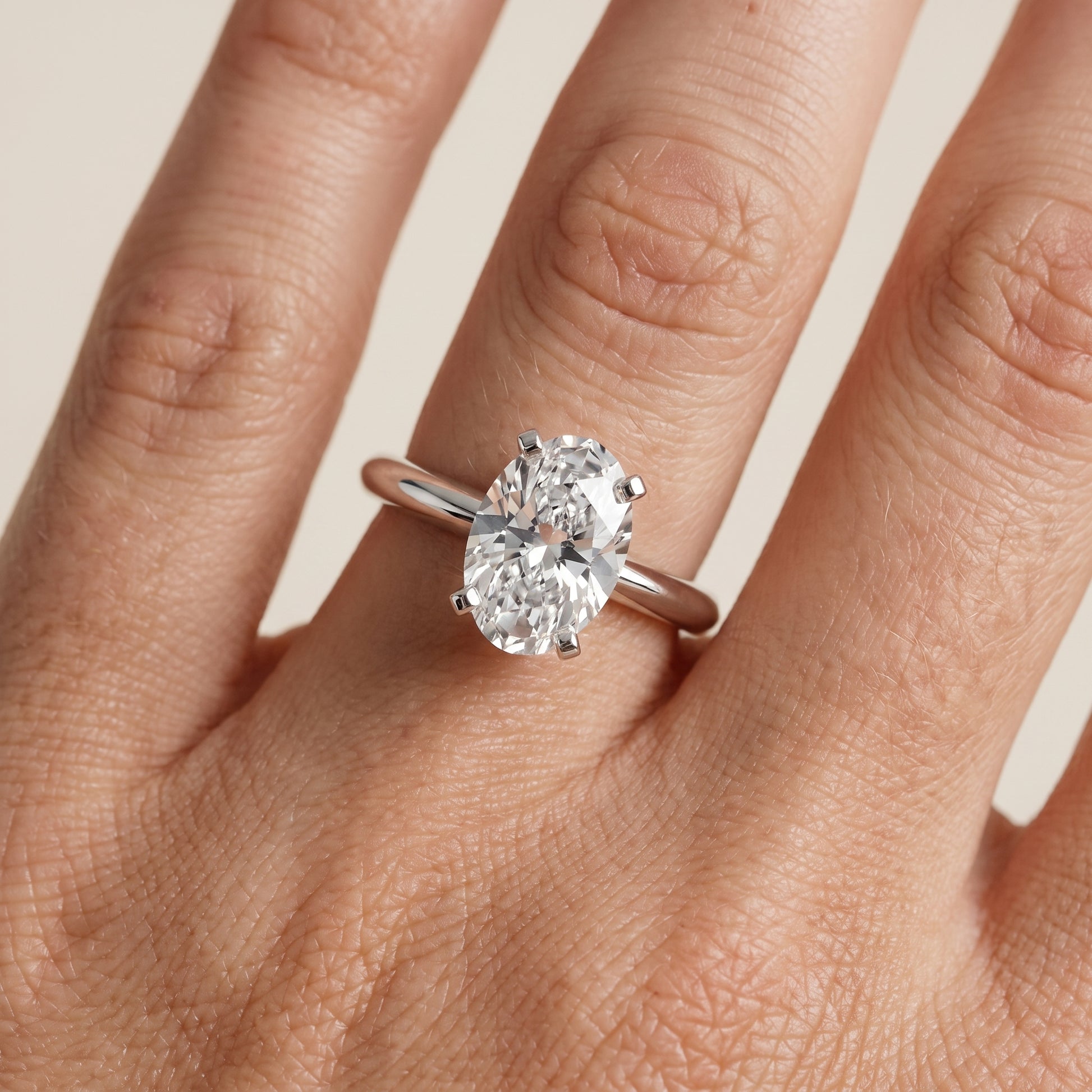 Amira Six-Prong Solitaire Oval Diamond Engagement Ring in Platinum - lifestyle.jpg