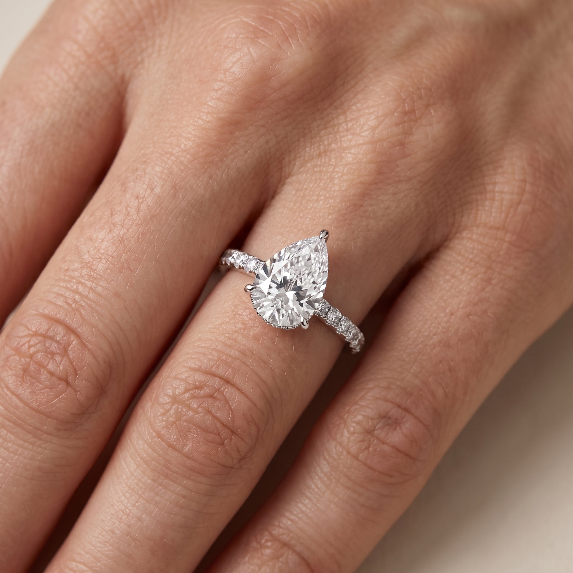 Thea Hidden Halo Pavé Pear Diamond Engagement Ring in Silver - lifestyle.jpg