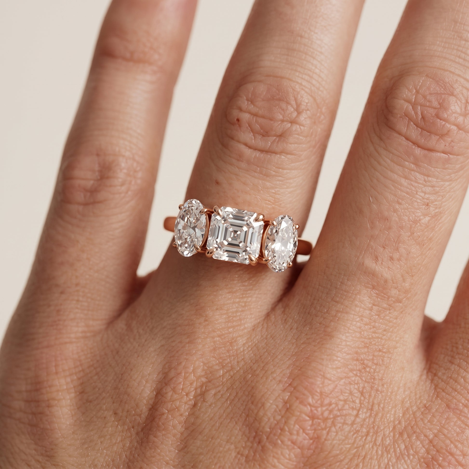 Lila Three-Stone Asscher Diamond Ring in Rose Gold - lifestyle.jpg