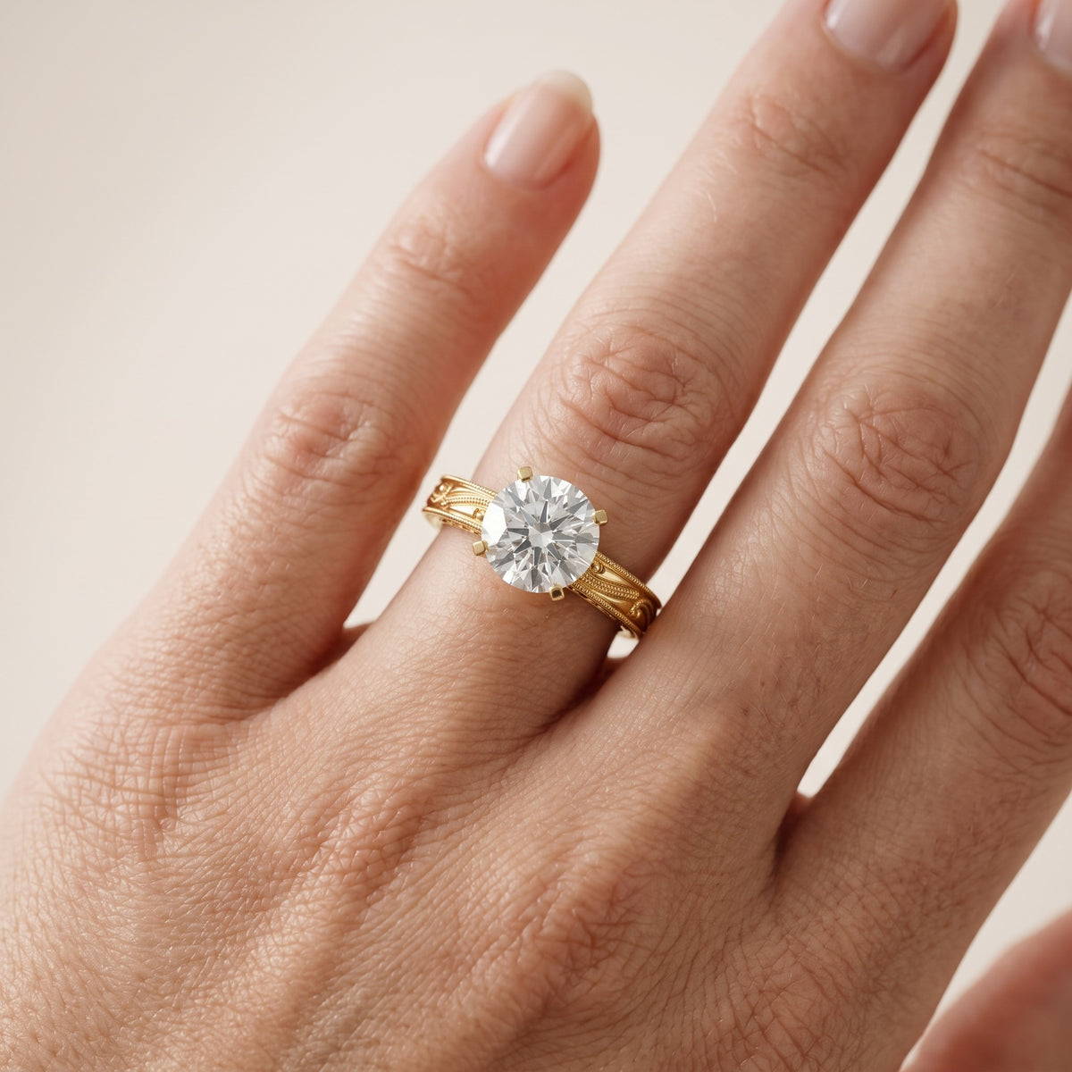 Abbie Engraved Solitaire Round Diamond Engagement Ring in Yellow Gold - lifestyle.jpg
