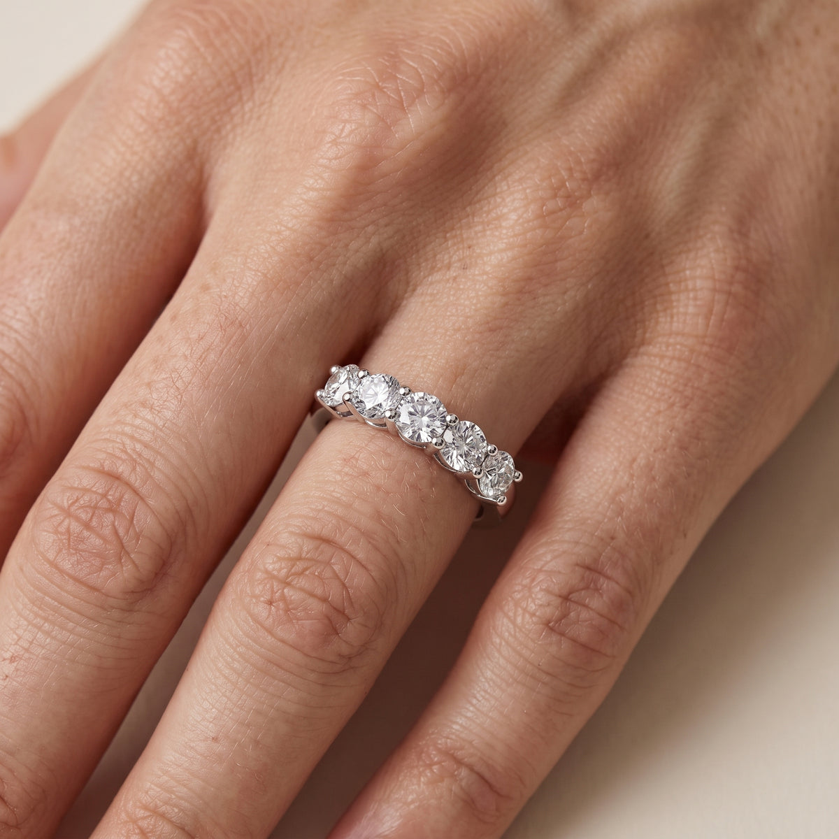 Cecilia Shared Prong Round Diamond Wedding Band in Platinum - lifestyle.jpg