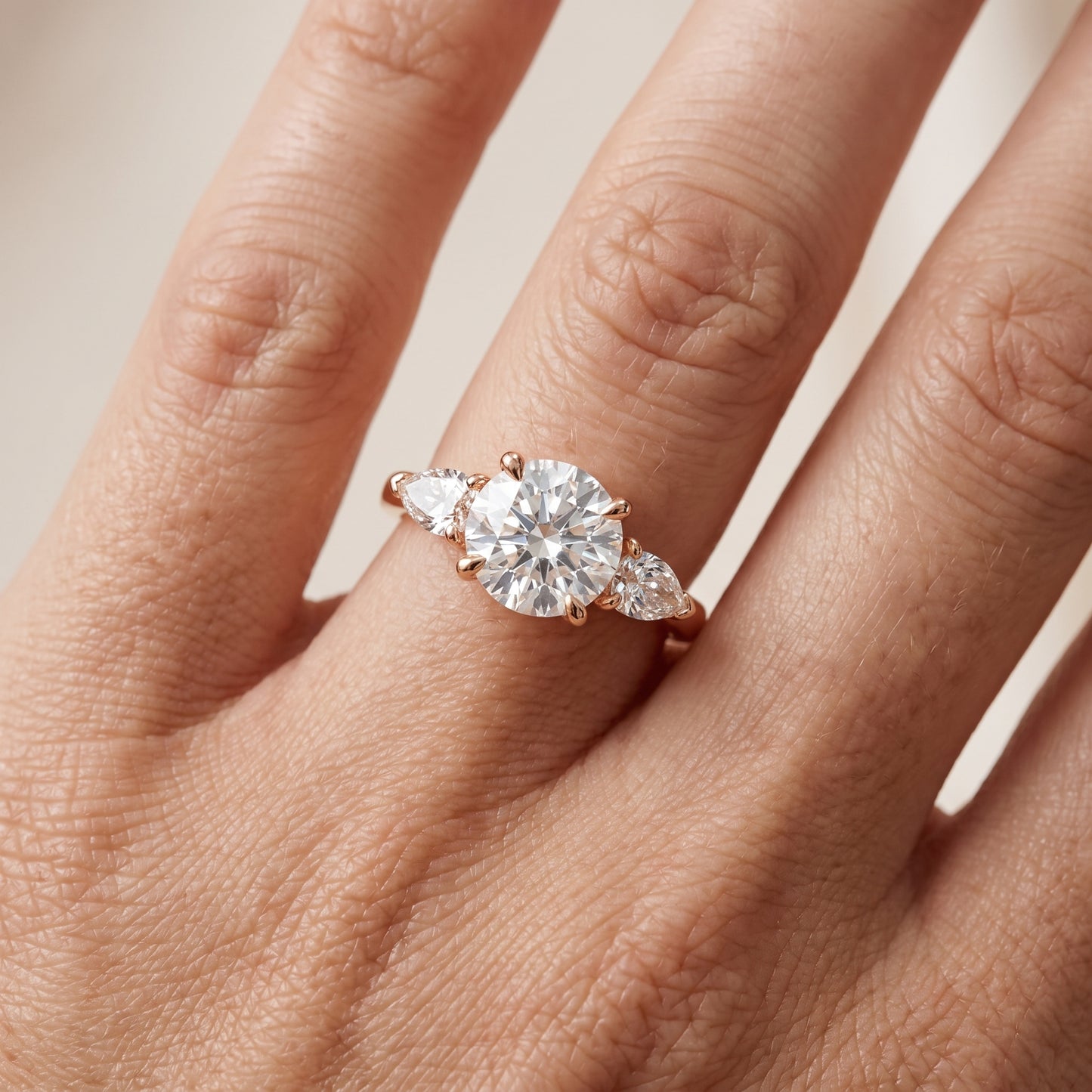 Faye Three-Stone Trellis Round Diamond Ring in Rose Gold - lifestyle.jpg