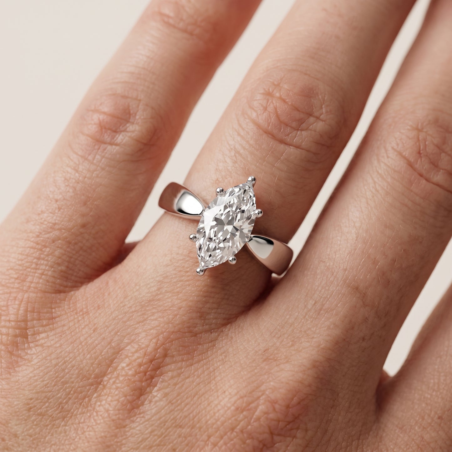 Talia Solitaire Twist Marquise Diamond Engagement Ring in Platinum - lifestyle.jpg
