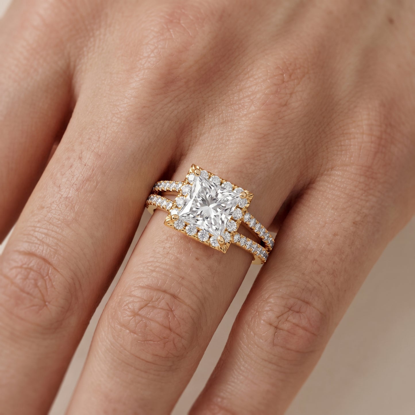 Kira Halo Split Shank Princess Diamond Engagement Ring in Yellow Gold - lifestyle.jpg