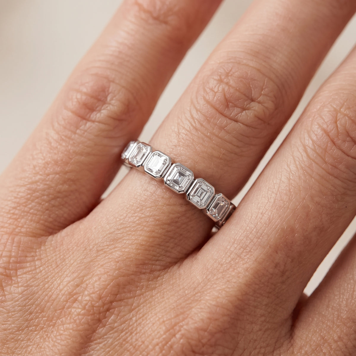 Galia Bezel Asscher Diamond Half Eternity Band in Platinum - lifestyle.jpg