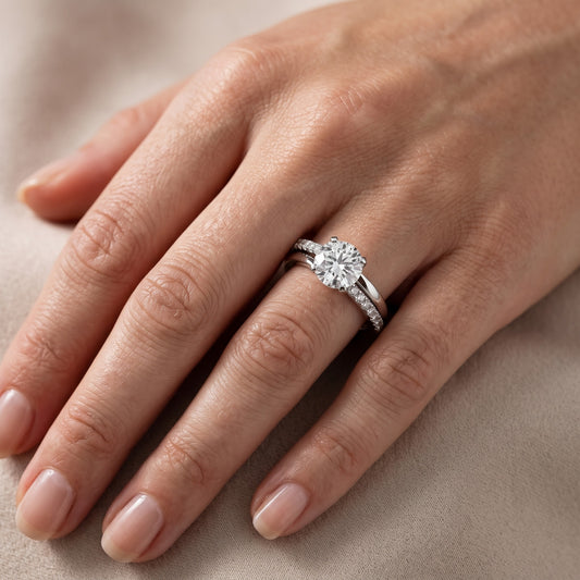 Edith Criss Cross Pavé Round Diamond Engagement Ring in Platinum - lifestyle.jpg