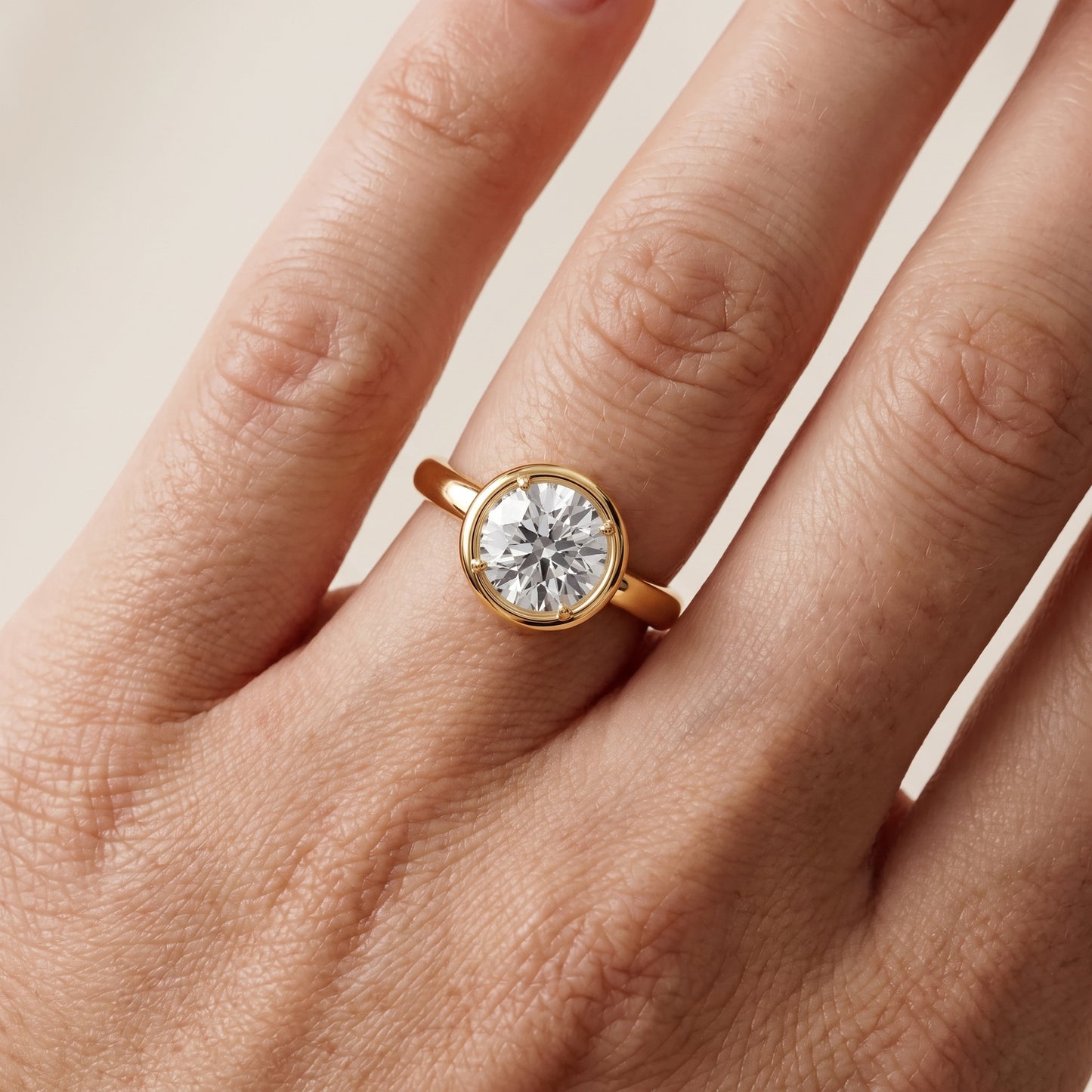 Alina Bezel Solitaire Round Diamond Ring in Yellow Gold - lifestyle.jpg