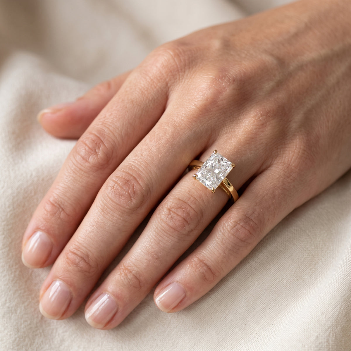 Kaia Solitaire Radiant Diamond Engagement Ring in Yellow Gold - lifestyle.jpg