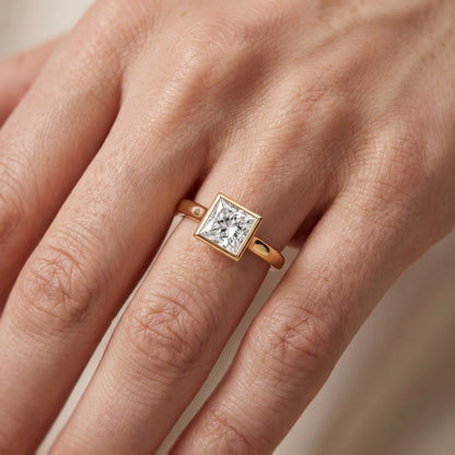 Jolie Bezel Solitaire Princess Diamond Engagement Ring in Yellow Gold - lifestyle.jpg