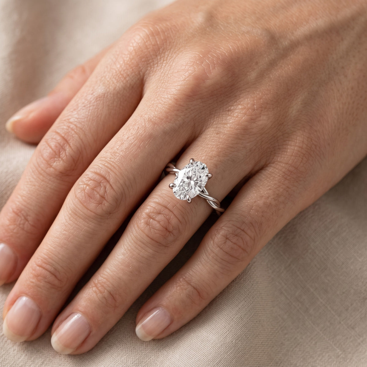 Iris Twist Oval Diamond Engagement Ring in Platinum - lifestyle.jpg