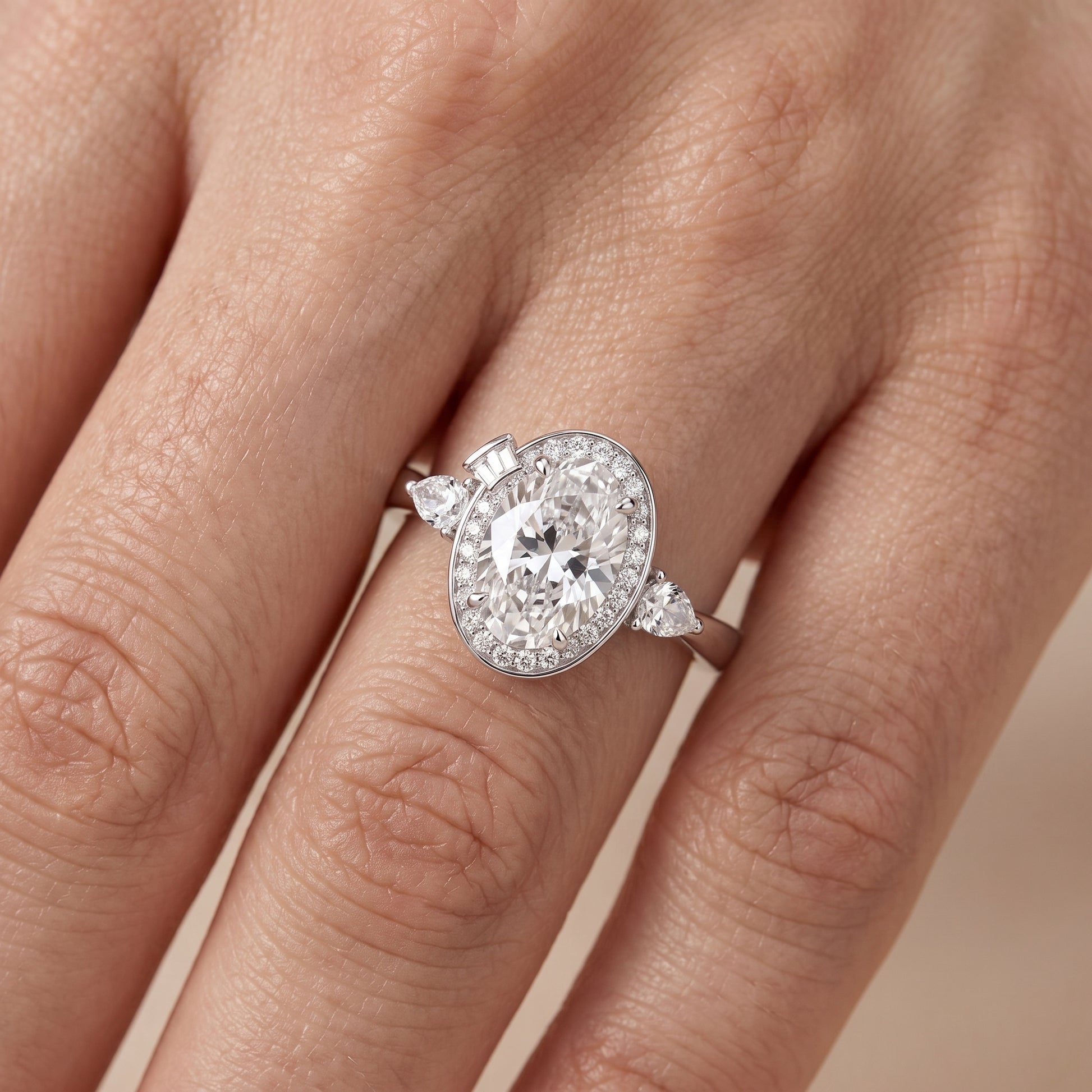 Eliza Halo Sidestone Oval Diamond Engagement Ring in Platinum - lifestyle.jpg