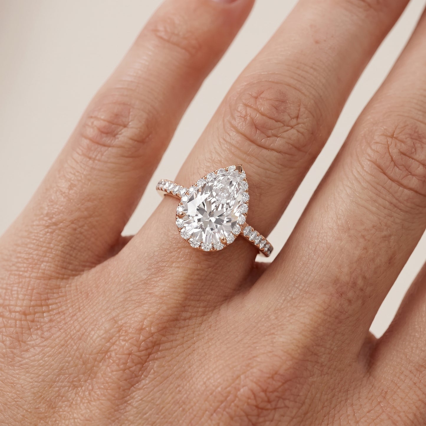 Willa Halo Micropavé Pear Diamond Engagement Ring in Rose Gold - lifestyle.jpg