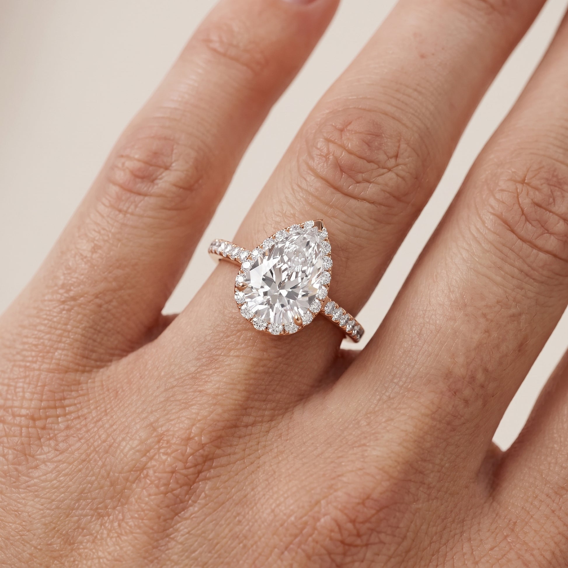 Willa Halo Micropavé Pear Diamond Engagement Ring in Rose Gold - lifestyle.jpg