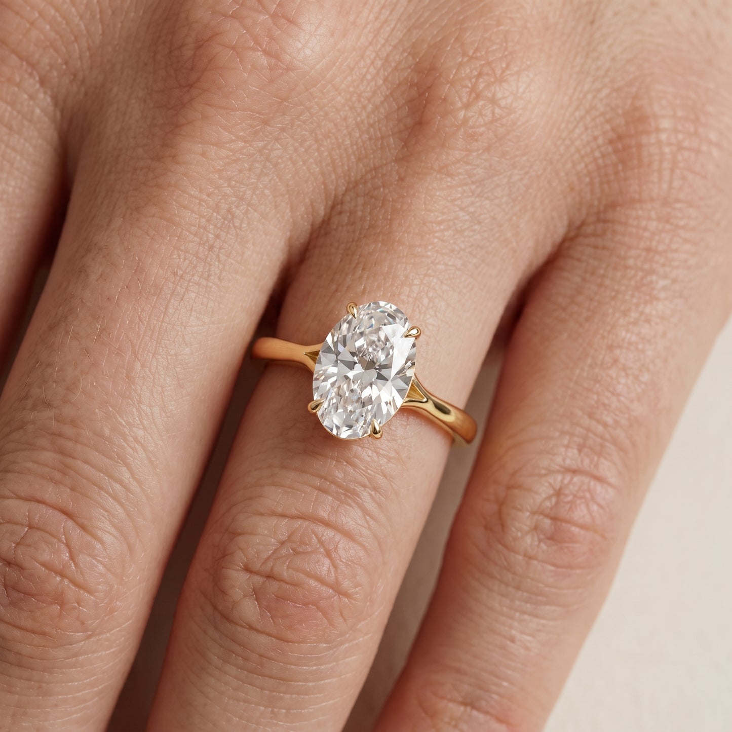 Anais Trellis Solitaire Oval Diamond Engagement Ring in Yellow Gold - lifestyle.jpg