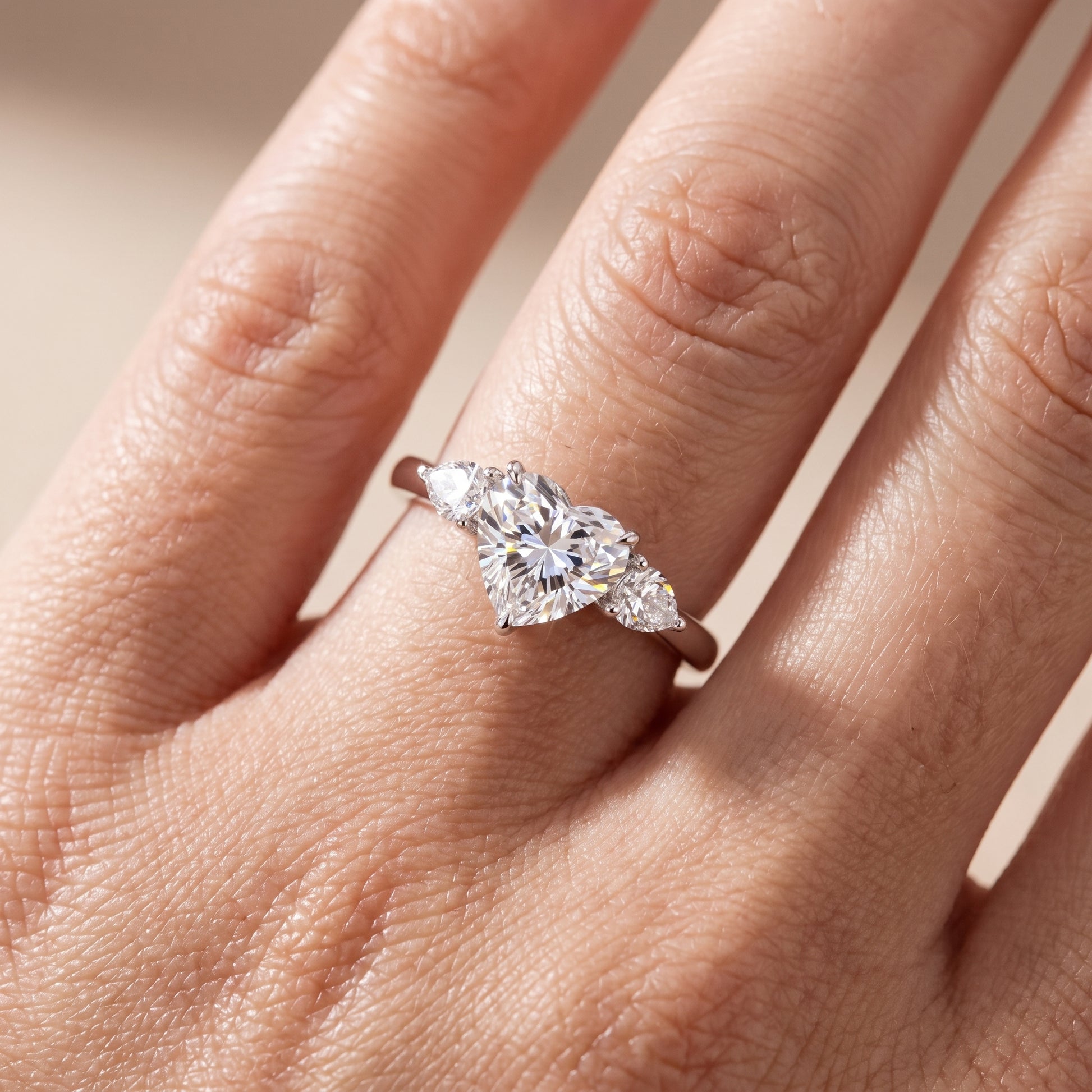 Phoebe Three-Stone Heart Diamond Ring in Platinum - lifestyle.jpg