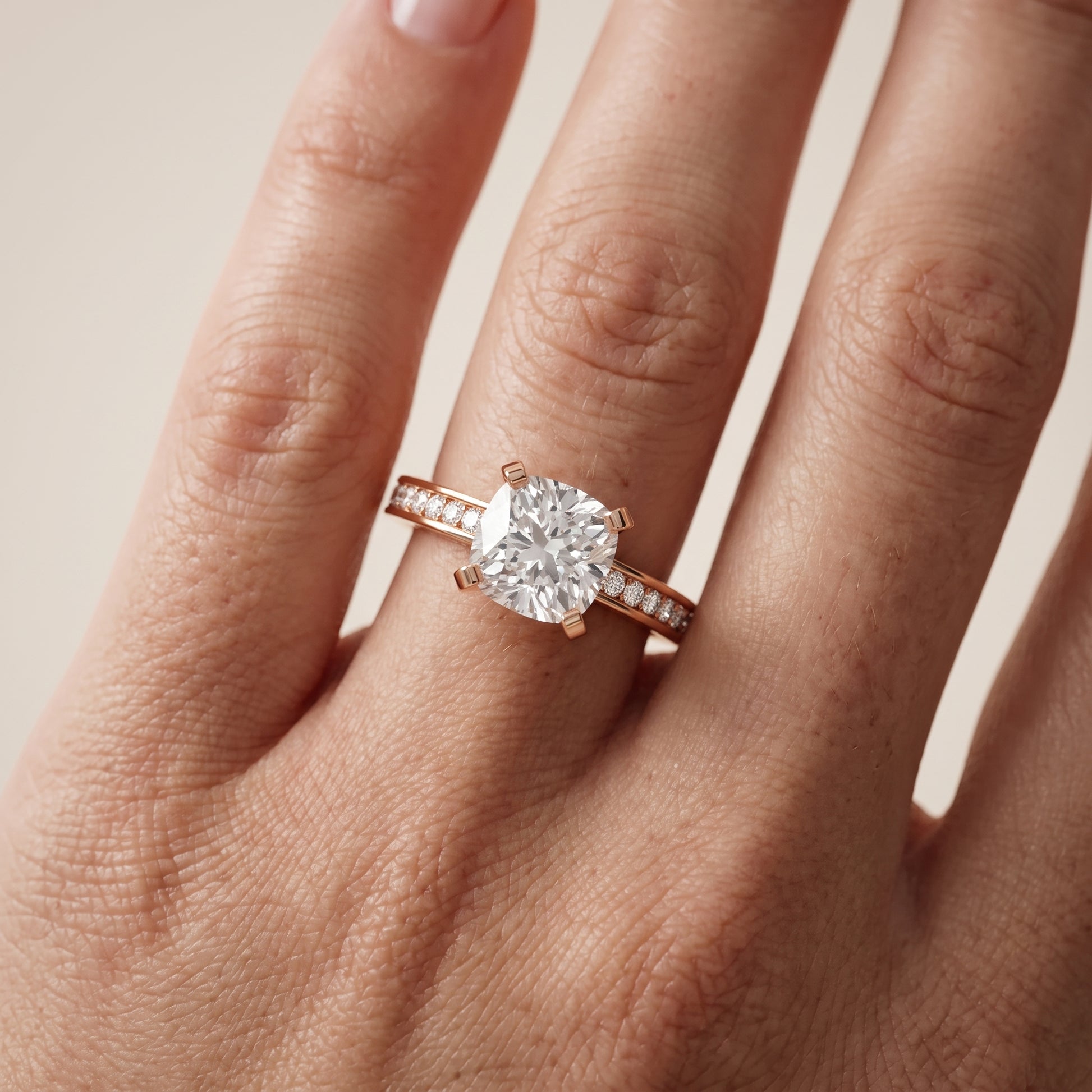 Tessa Solitaire Channel Set Cushion Diamond Engagement Ring in Rose Gold - lifestyle.jpg