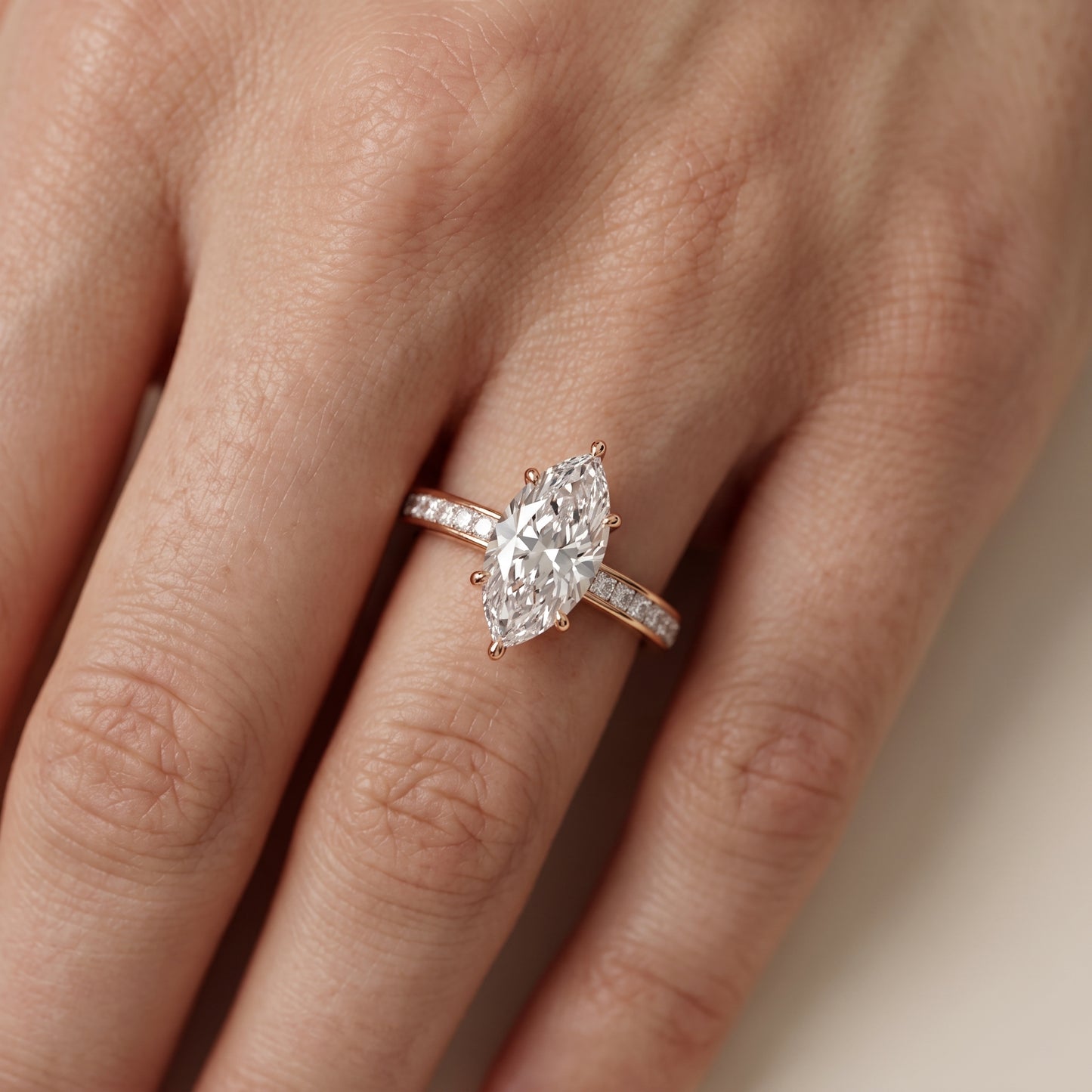 Brielle Channel Set Solitaire Marquise Diamond Ring in Rose Gold - lifestyle.jpg