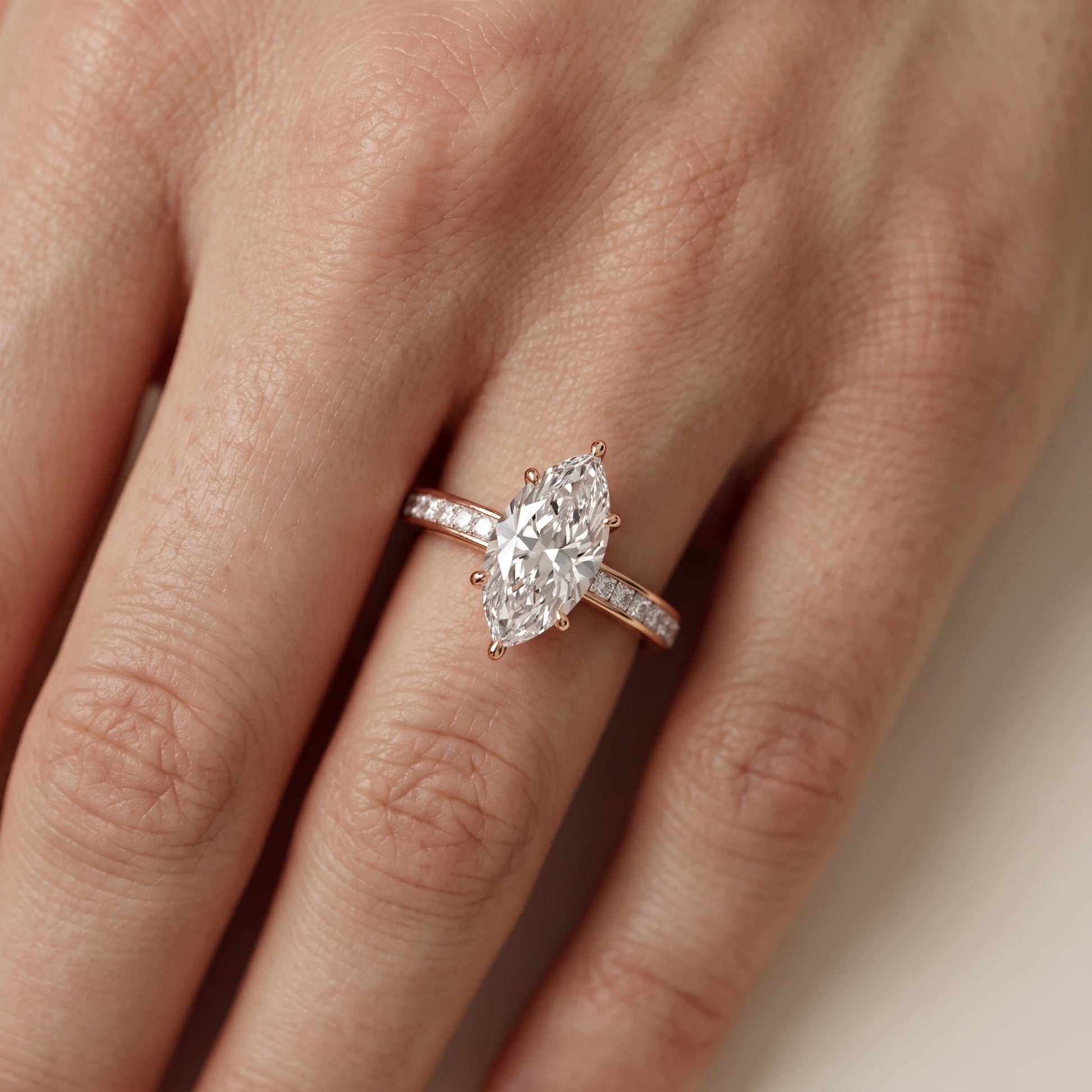 Brielle Channel Set Solitaire Marquise Diamond Ring in Rose Gold - lifestyle.jpg