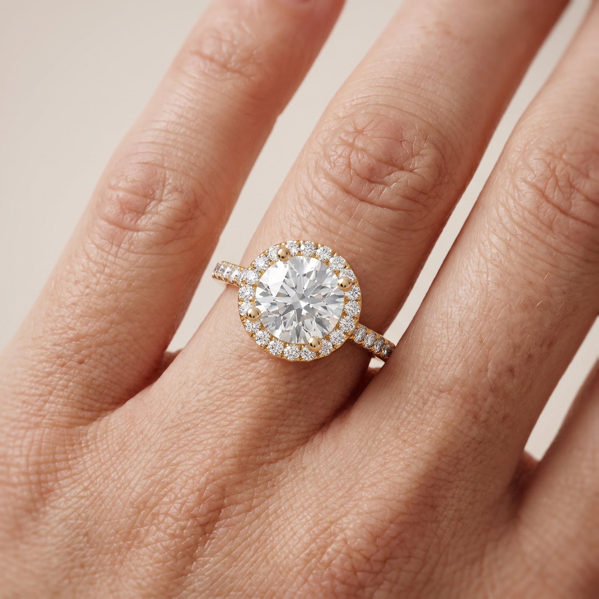 Sophie Halo Pavé Round Diamond Ring in Yellow Gold - lifestyle.jpg
