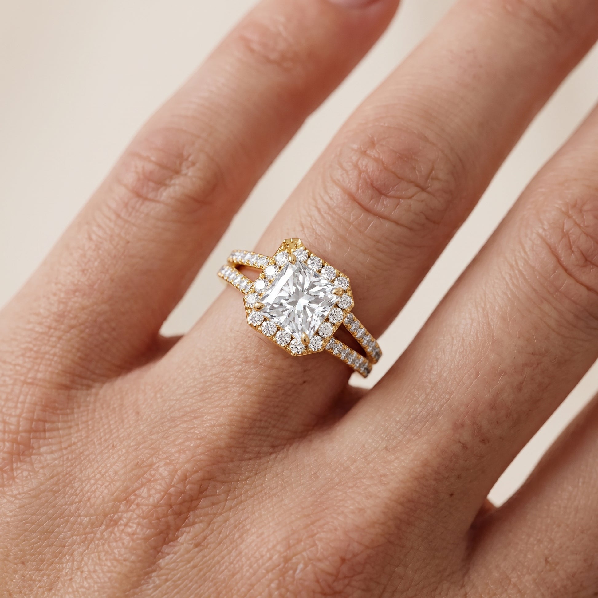 Kira Halo Split Shank Radiant Diamond Engagement Ring in Yellow Gold - lifestyle.jpg